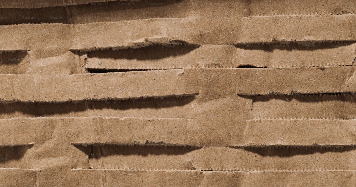 A close up of a piece of cardboard photo – Paper texture Image on Unsplash