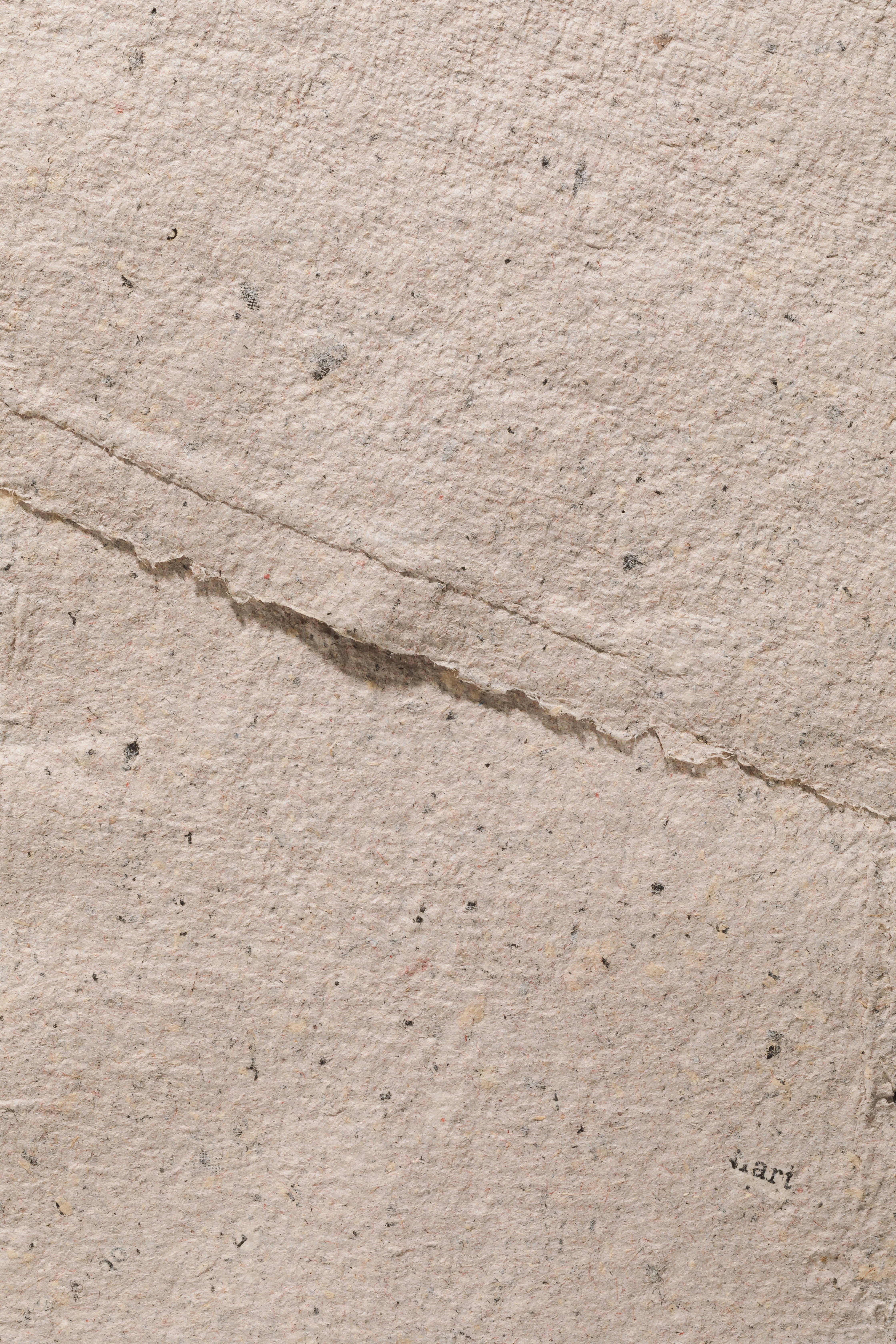 A piece of paper with a crack in it