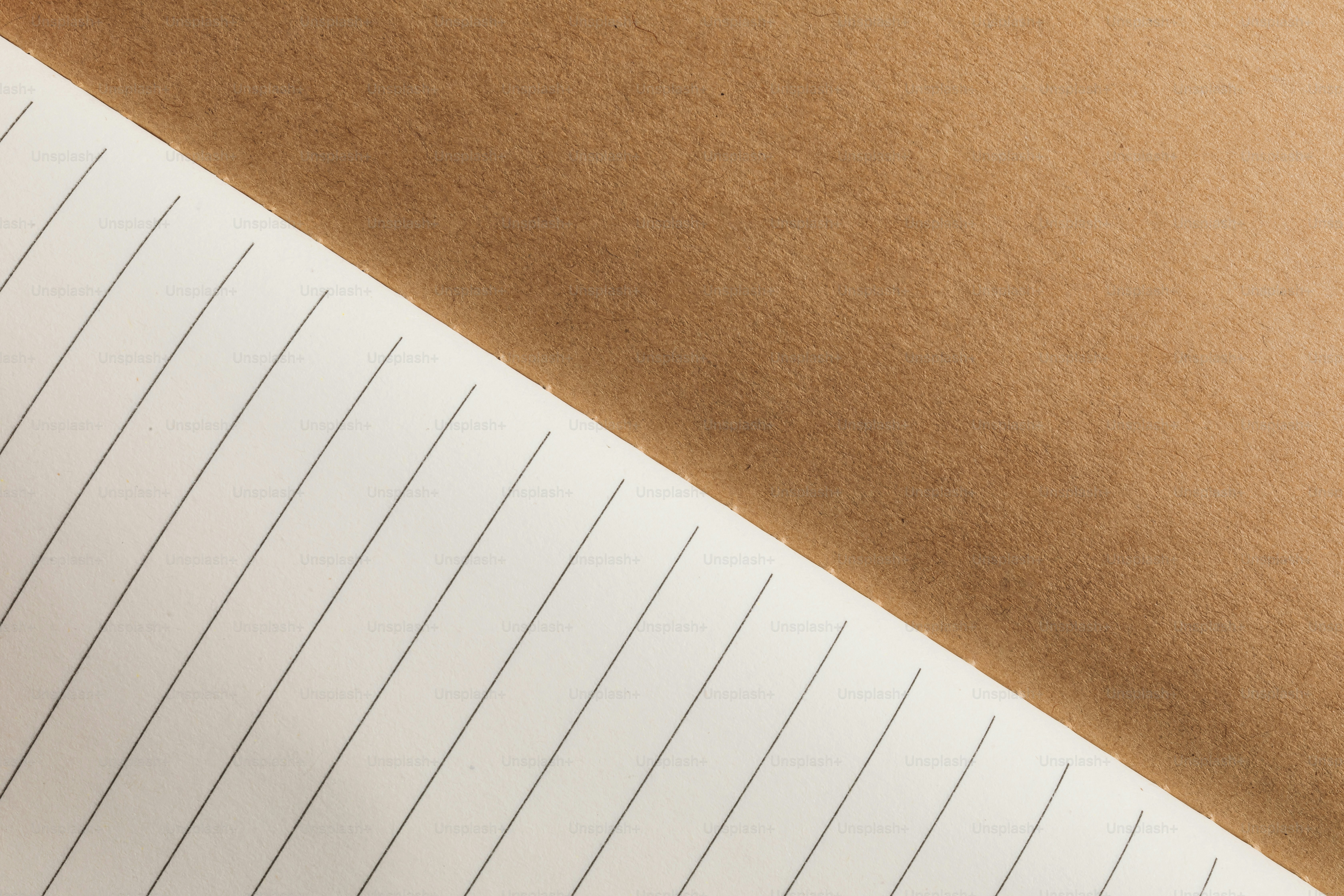 A pen is sitting on top of a piece of paper