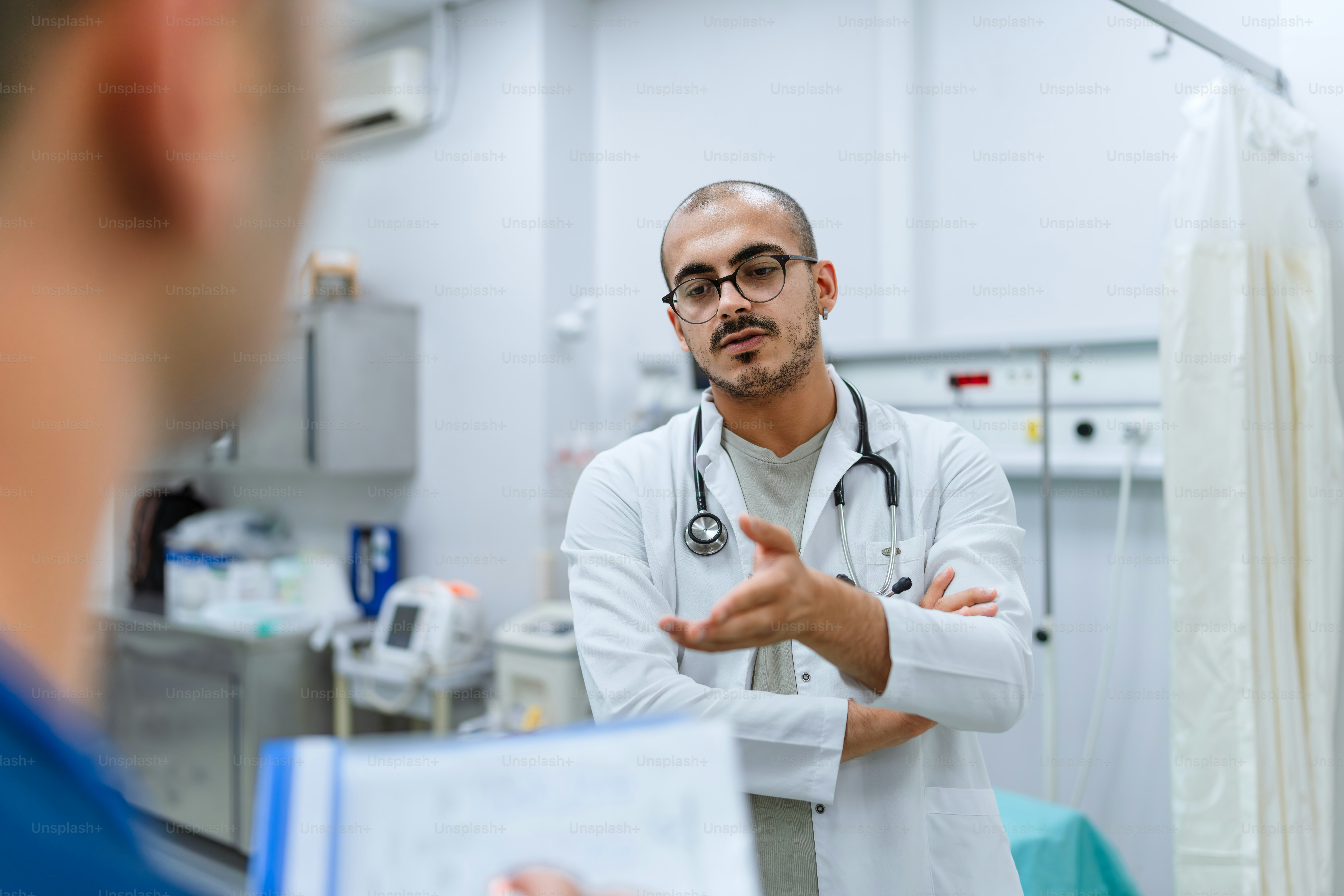A doctor talking to a patient in a hospital