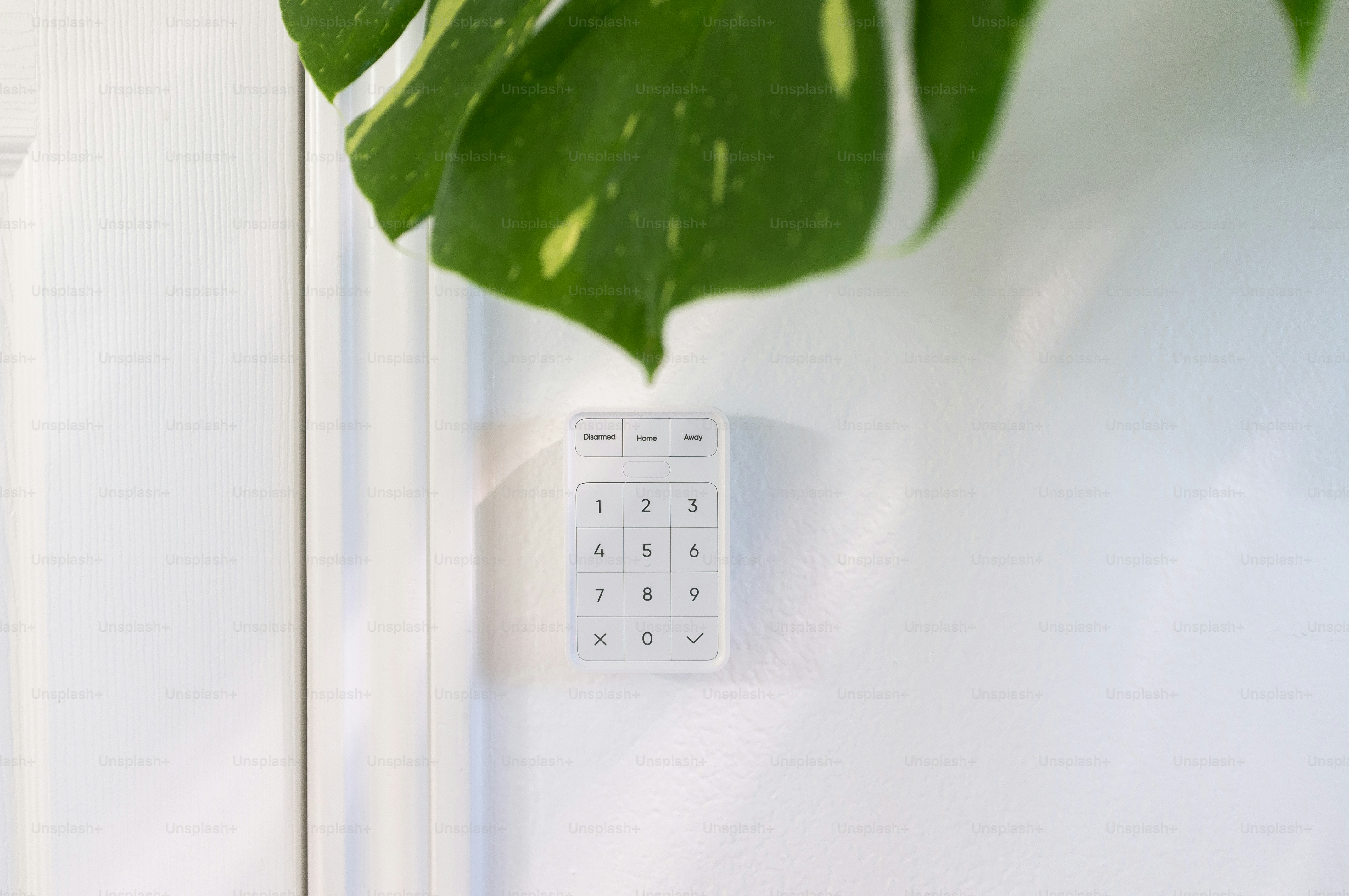 A close up of a remote control on a door