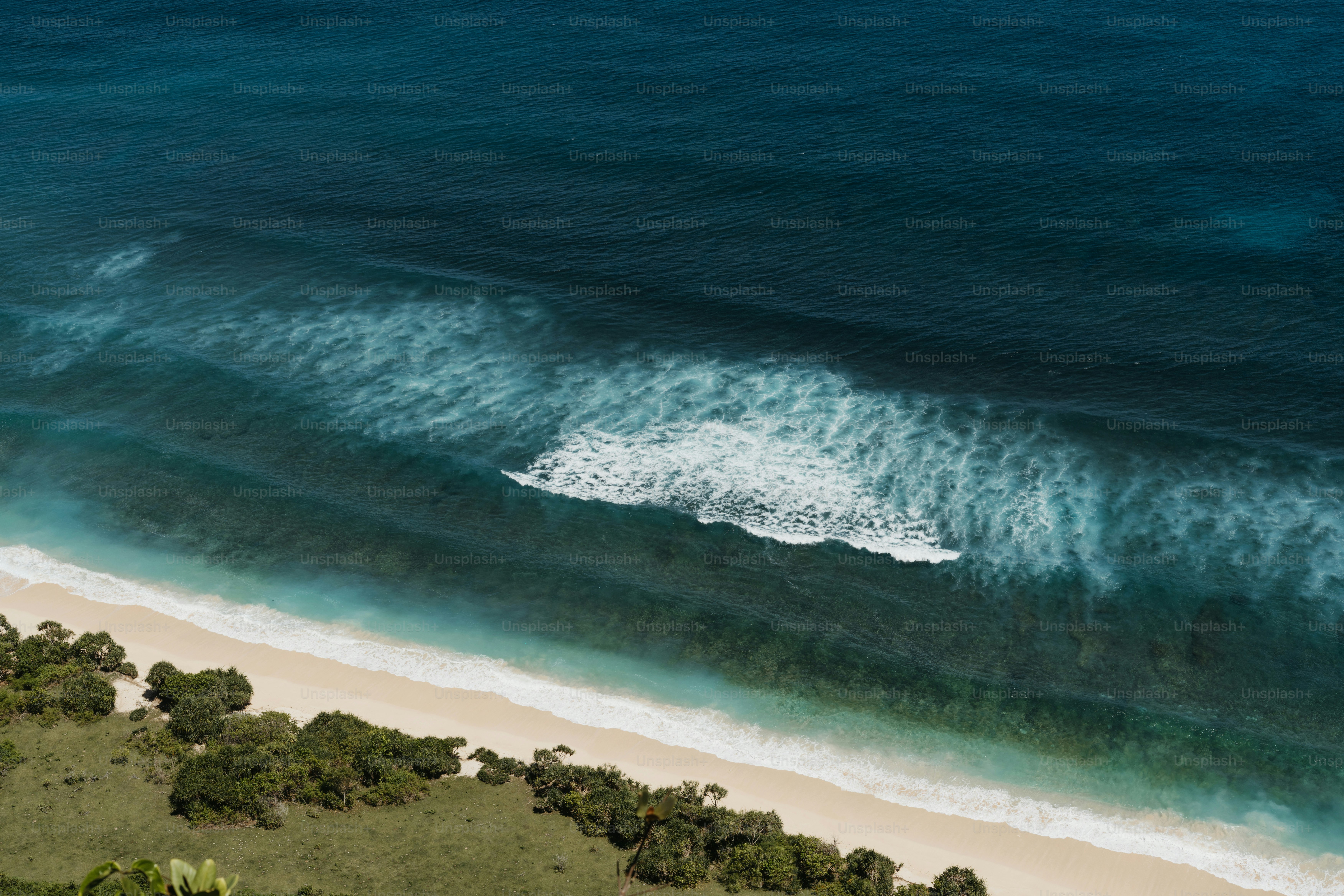 An aerial view of a beach and ocean