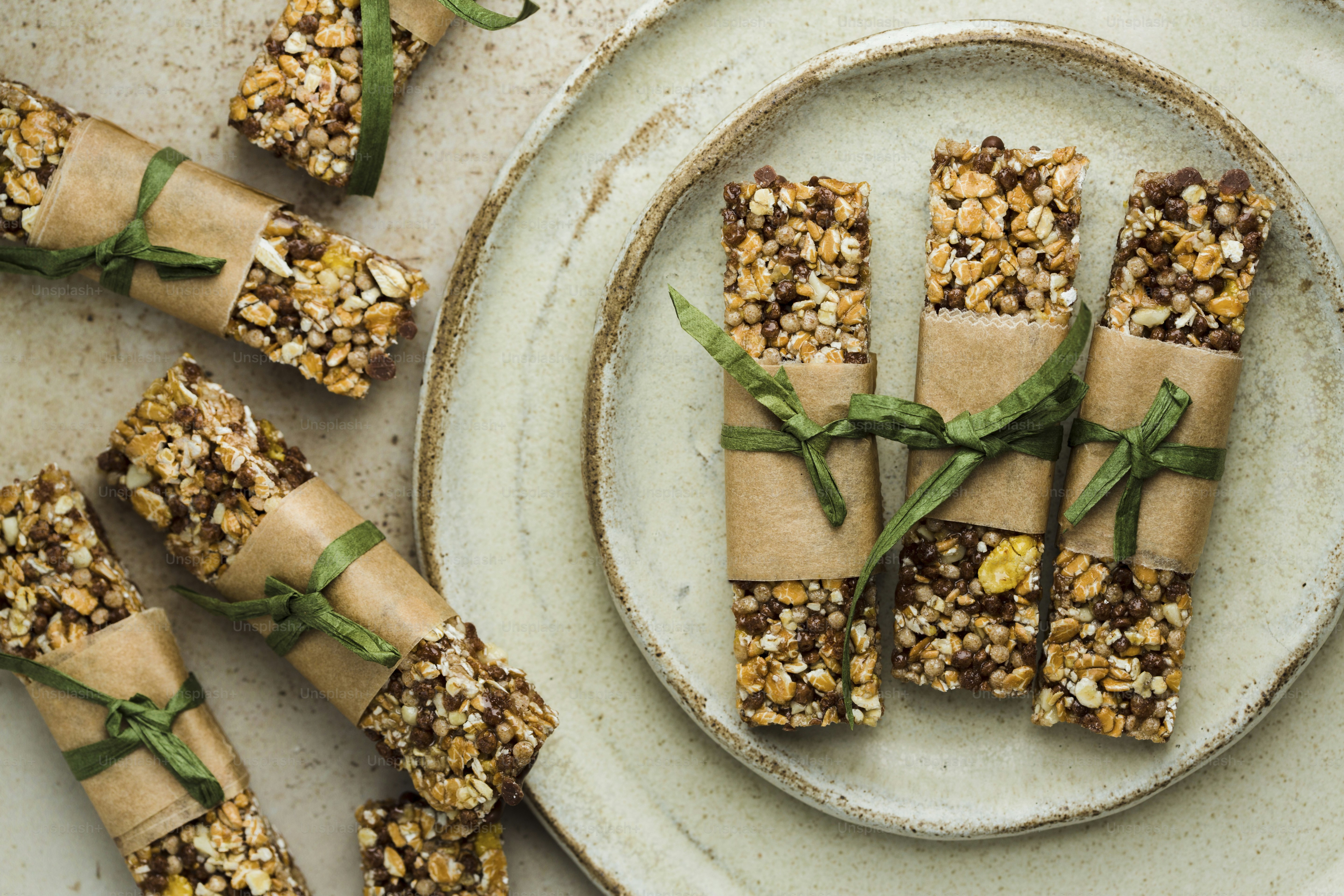 A white plate topped with crackers covered in toppings photo Healthy
