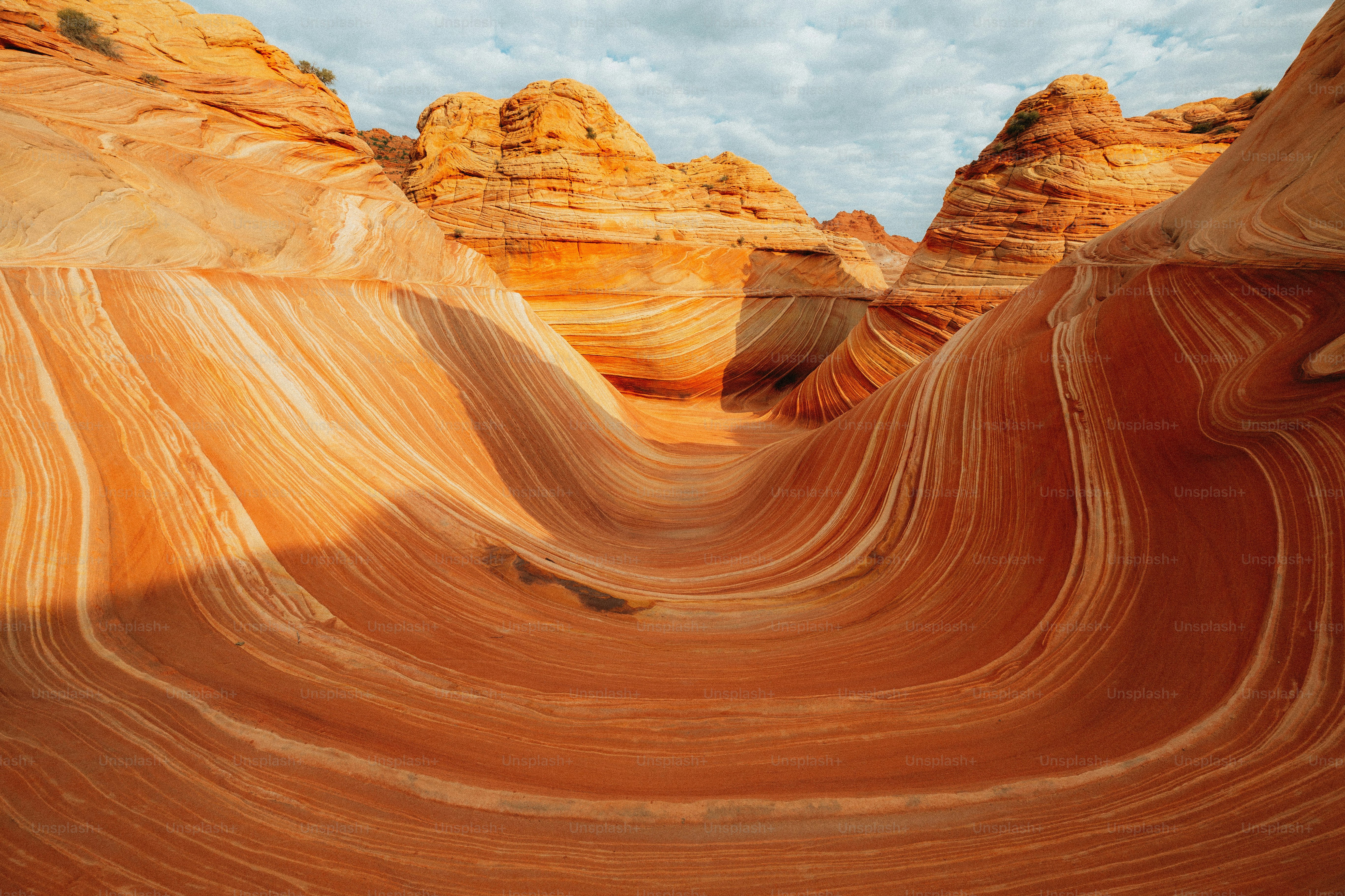 A rock formation with a sky background