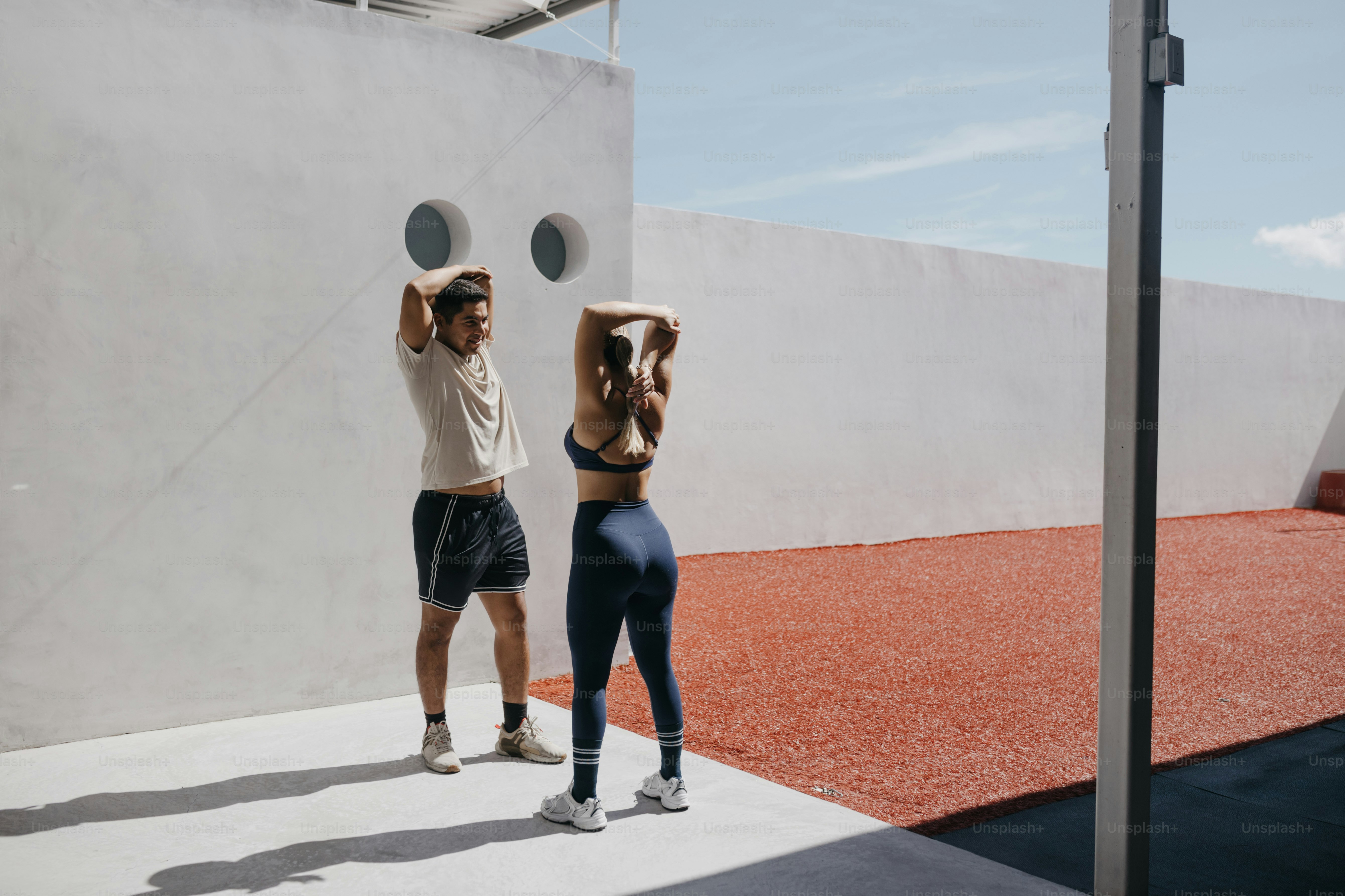 A couple of people standing next to each other