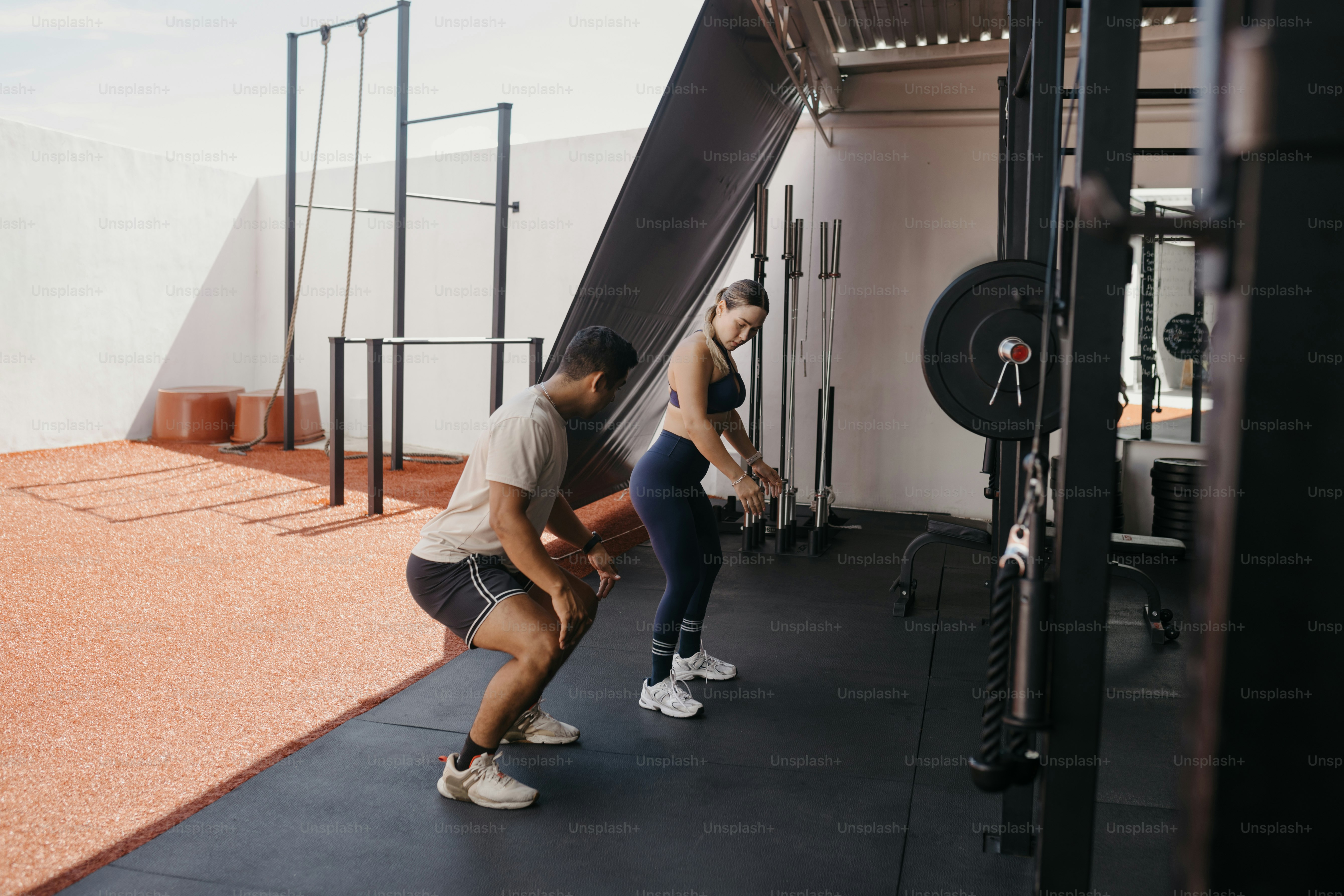 A couple of people that are in a gym