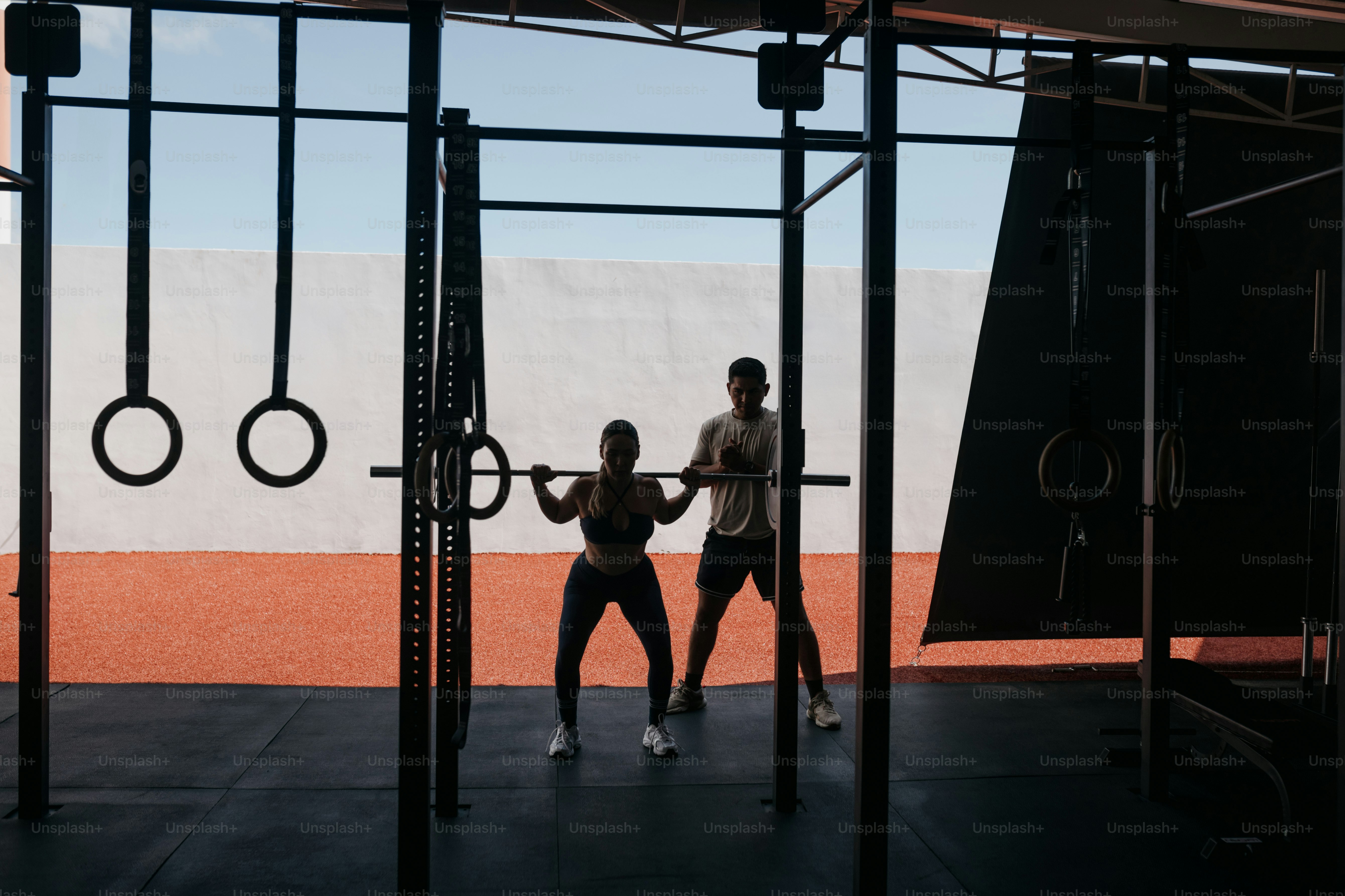 A couple of people that are in a gym