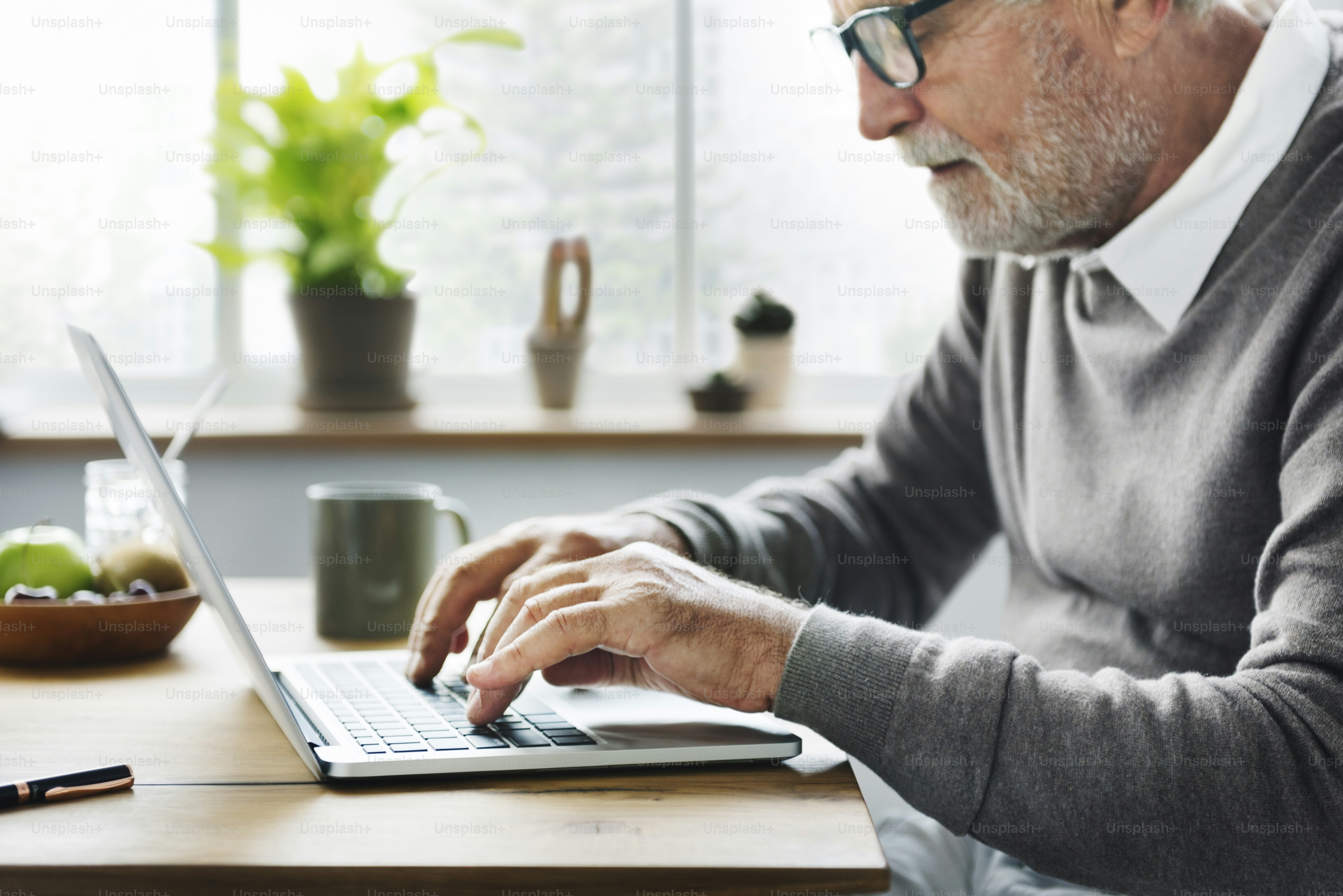 Senior Man using Digital Laptop Concept