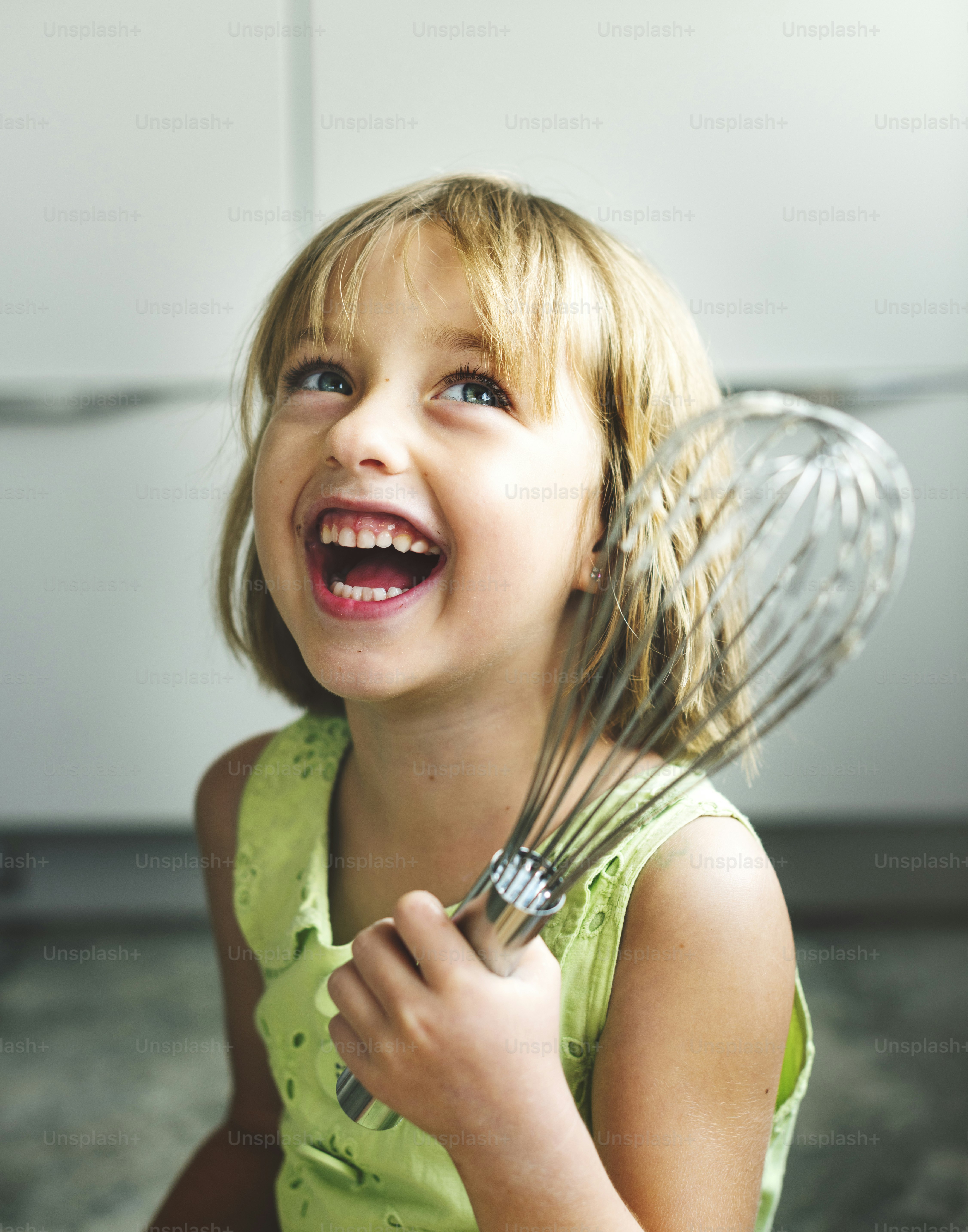 Little Girl Smiling Bake Cookie Concept