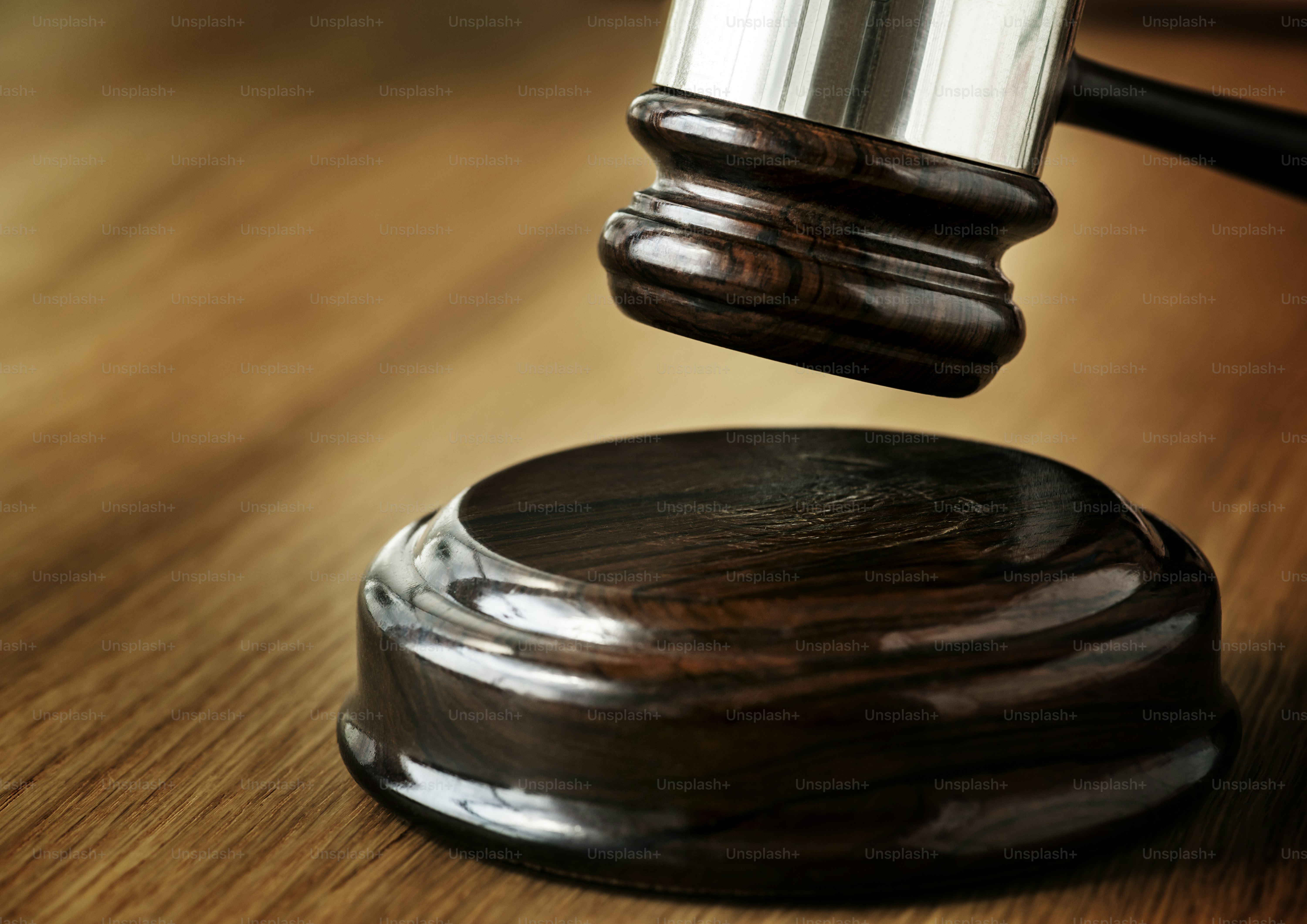 Closeup of stack of antique books auction, judgement and judical system concept