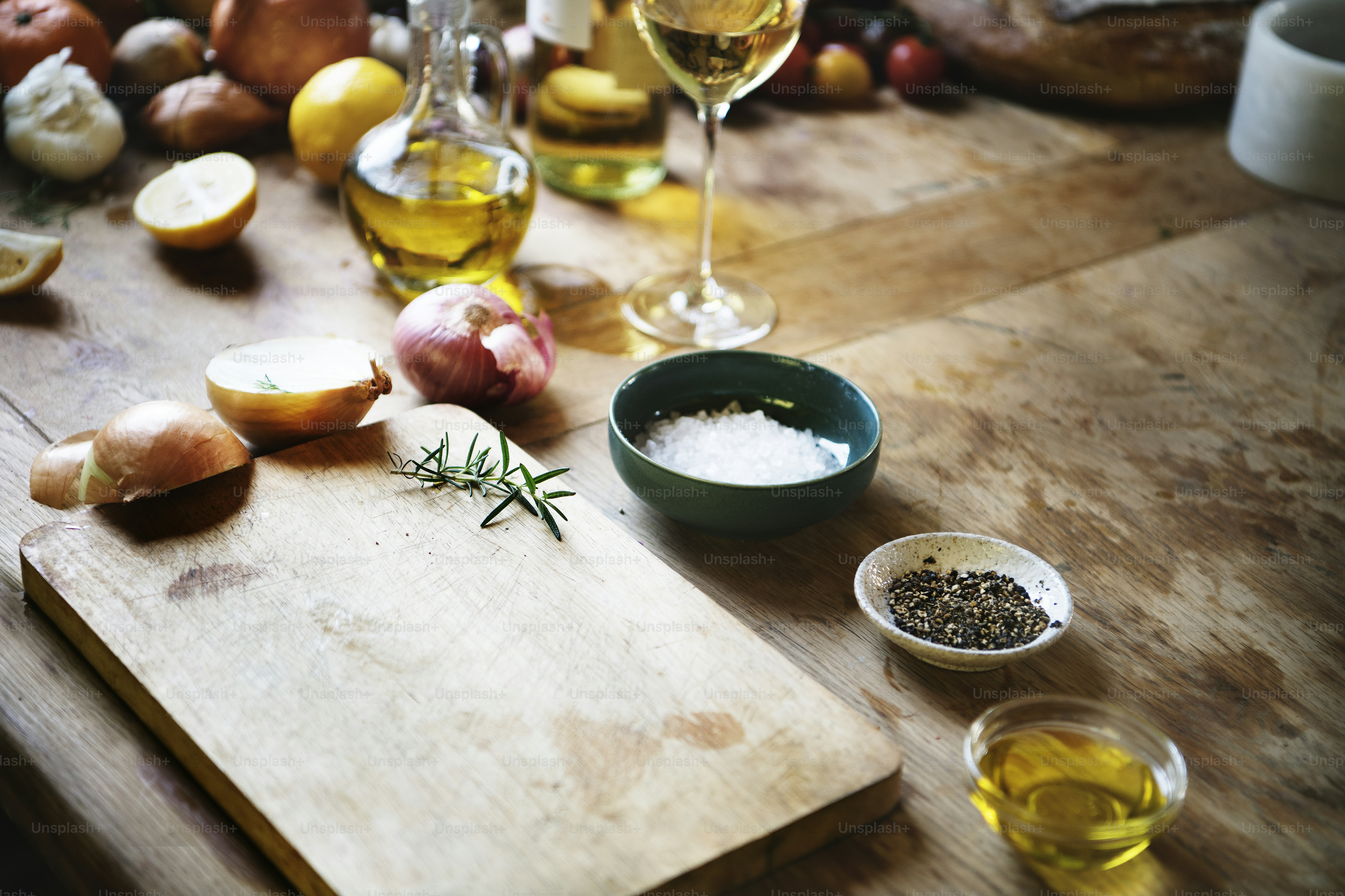 Cutting board and vegetables on a wooden table