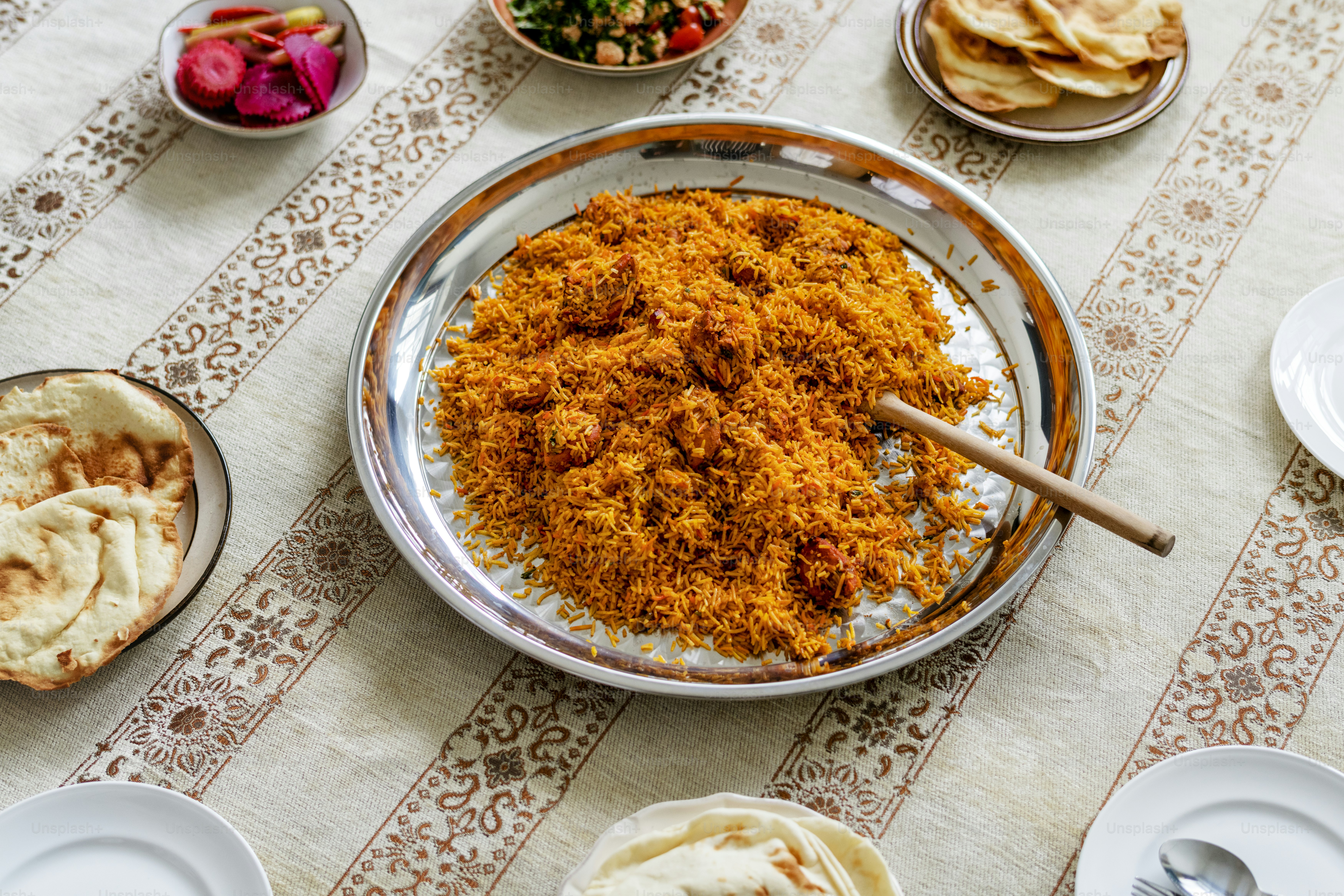 Muslim family having dinner on the floor