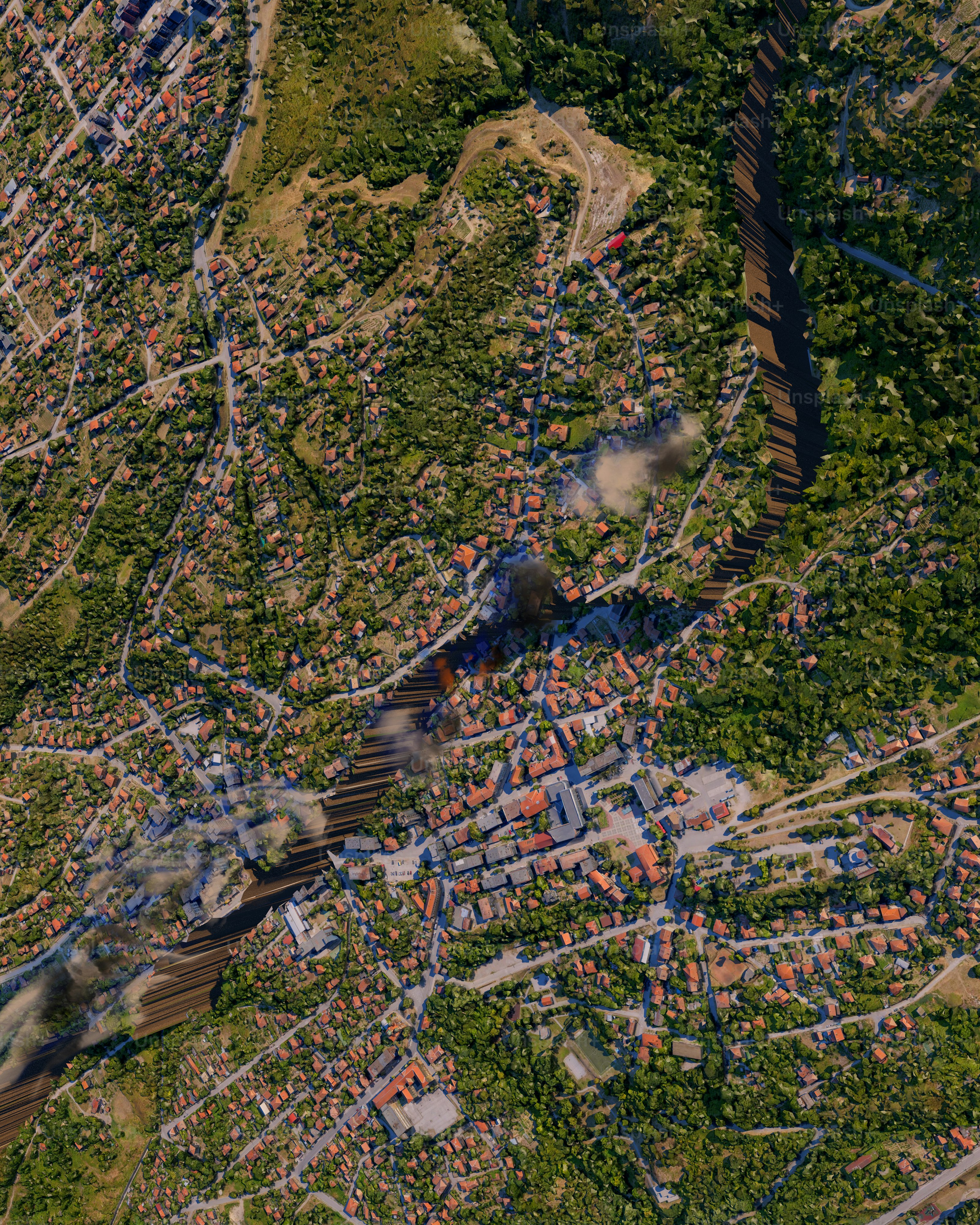 An aerial view of a city with a river running through it