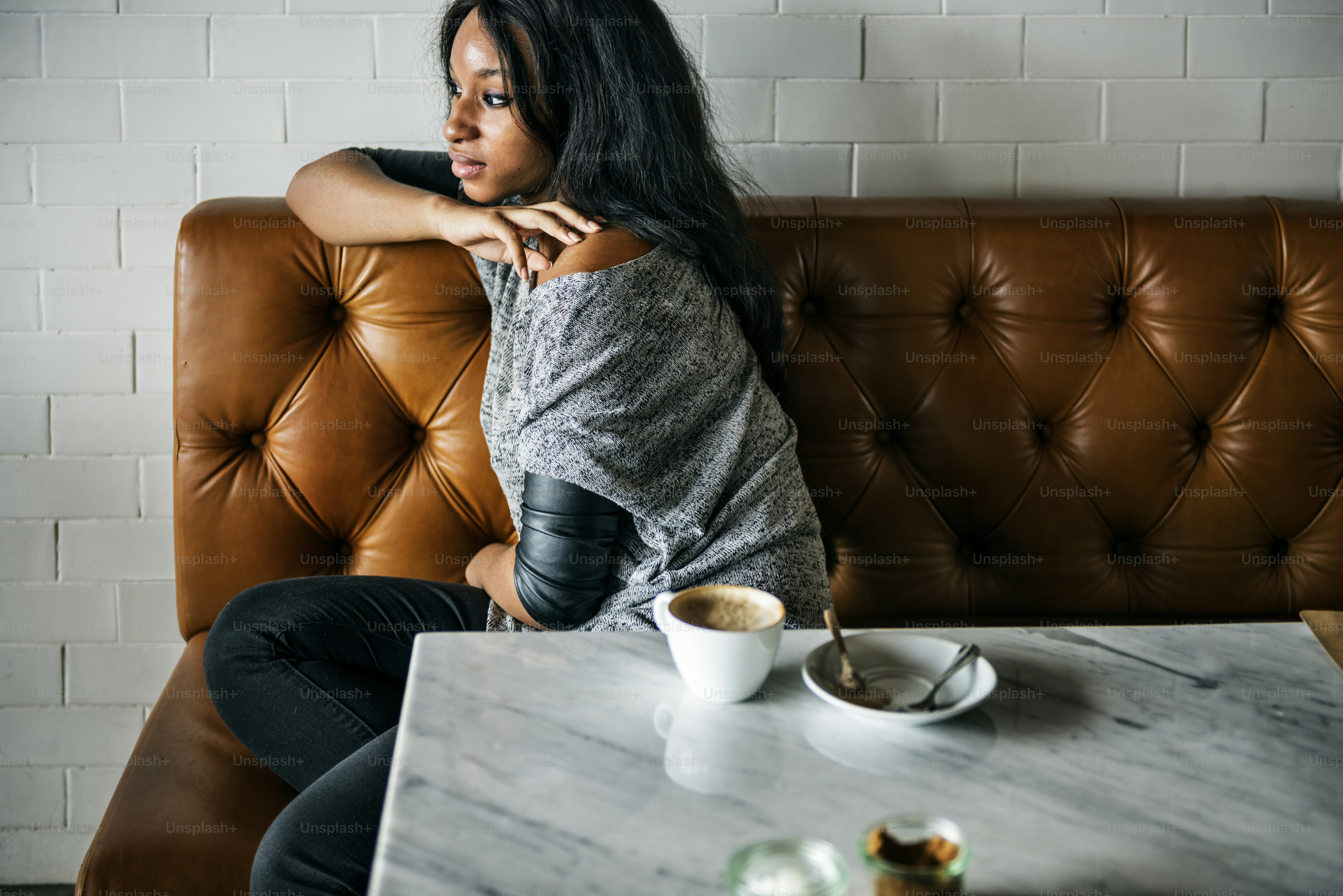 African Woman Drinks Coffee Shop Lonely Concept