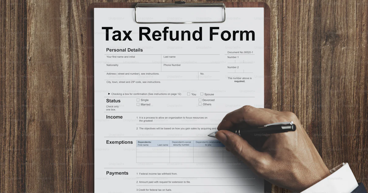 Businessmen Tax Refund Form Paper Registration Concept photo – Finance ...