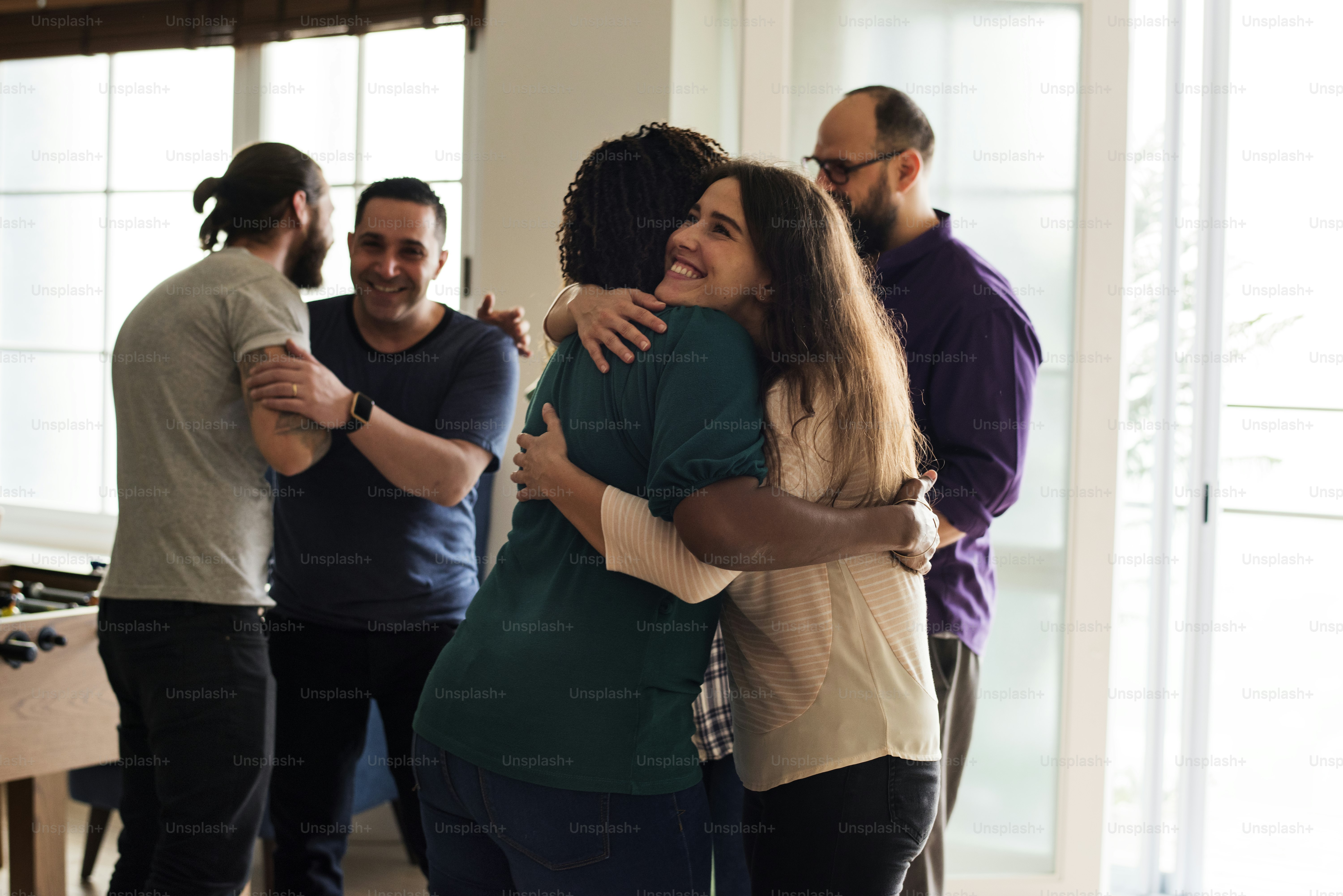 Friends hugging each other