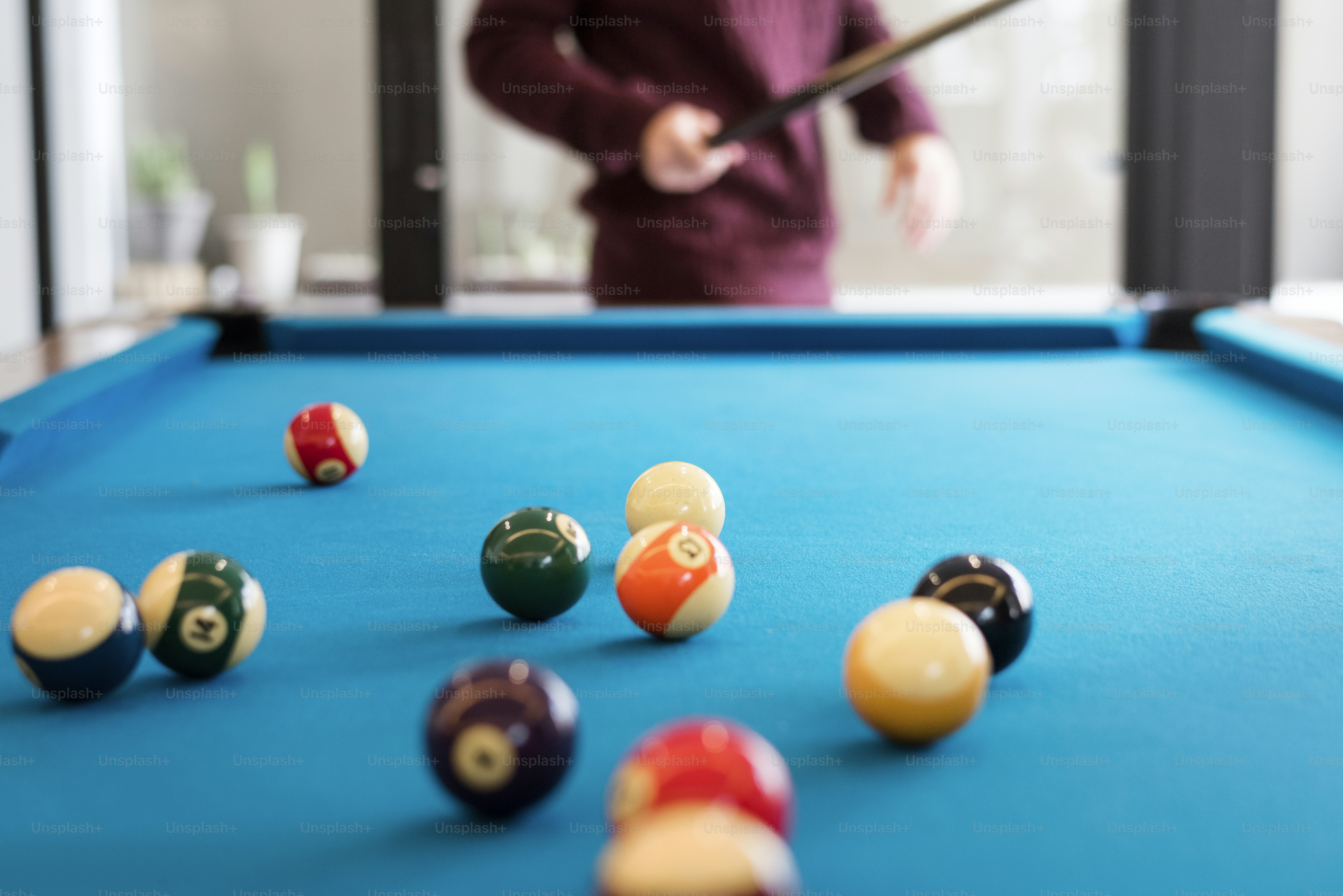 Billiard balls on a pool table
