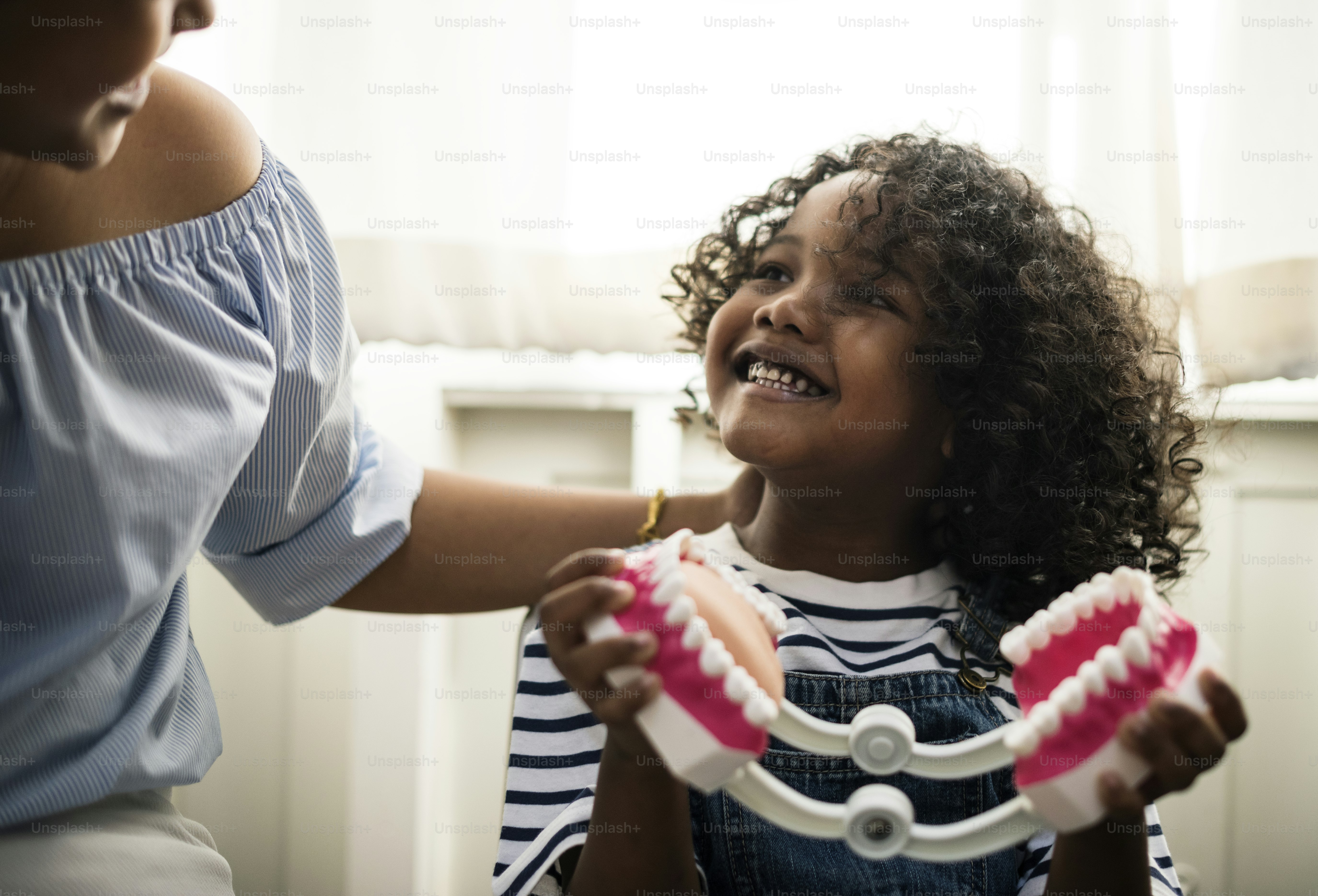 Young kid is meeting a dentist