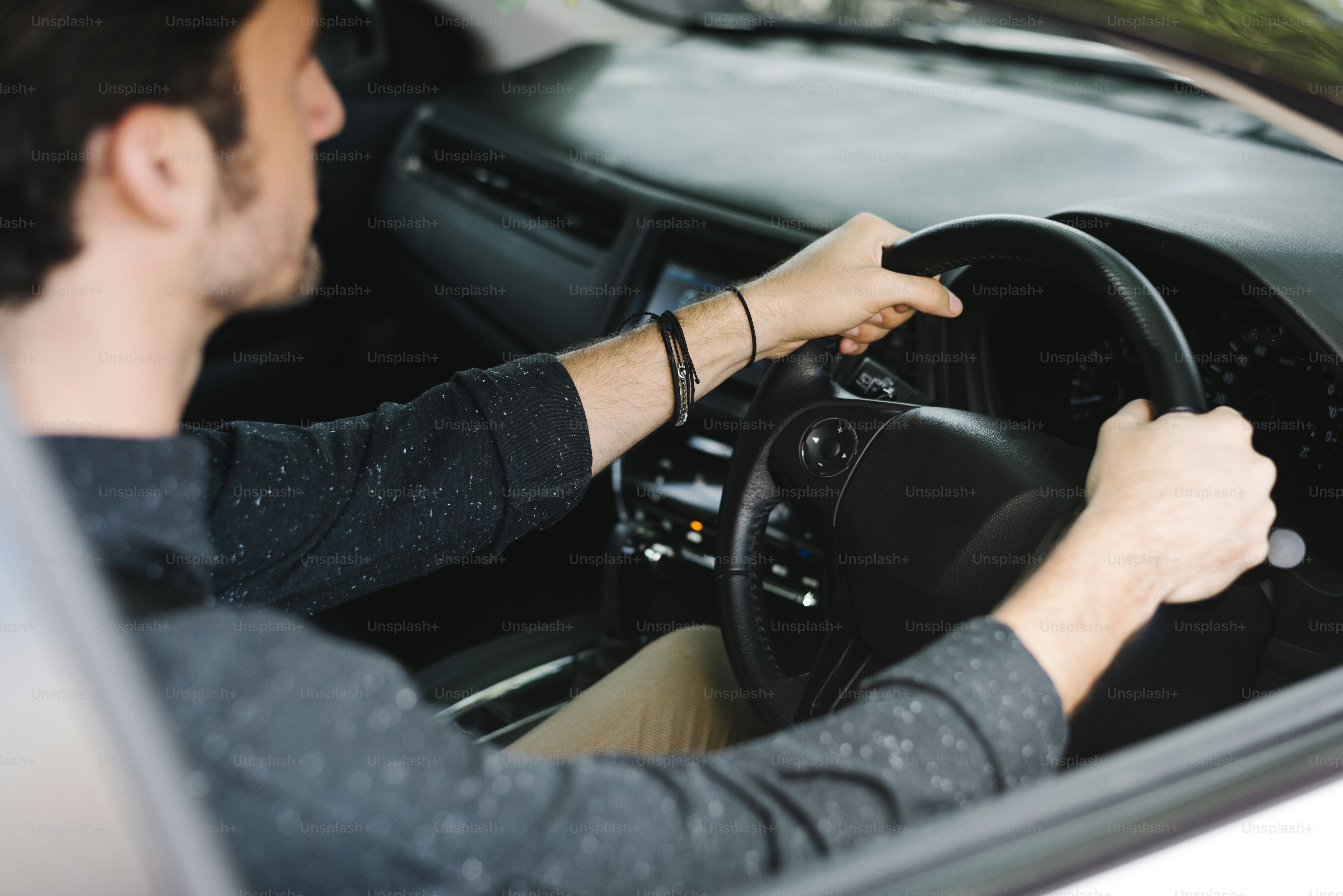 Male driver sitting in a car photo – Travel Image on Unsplash