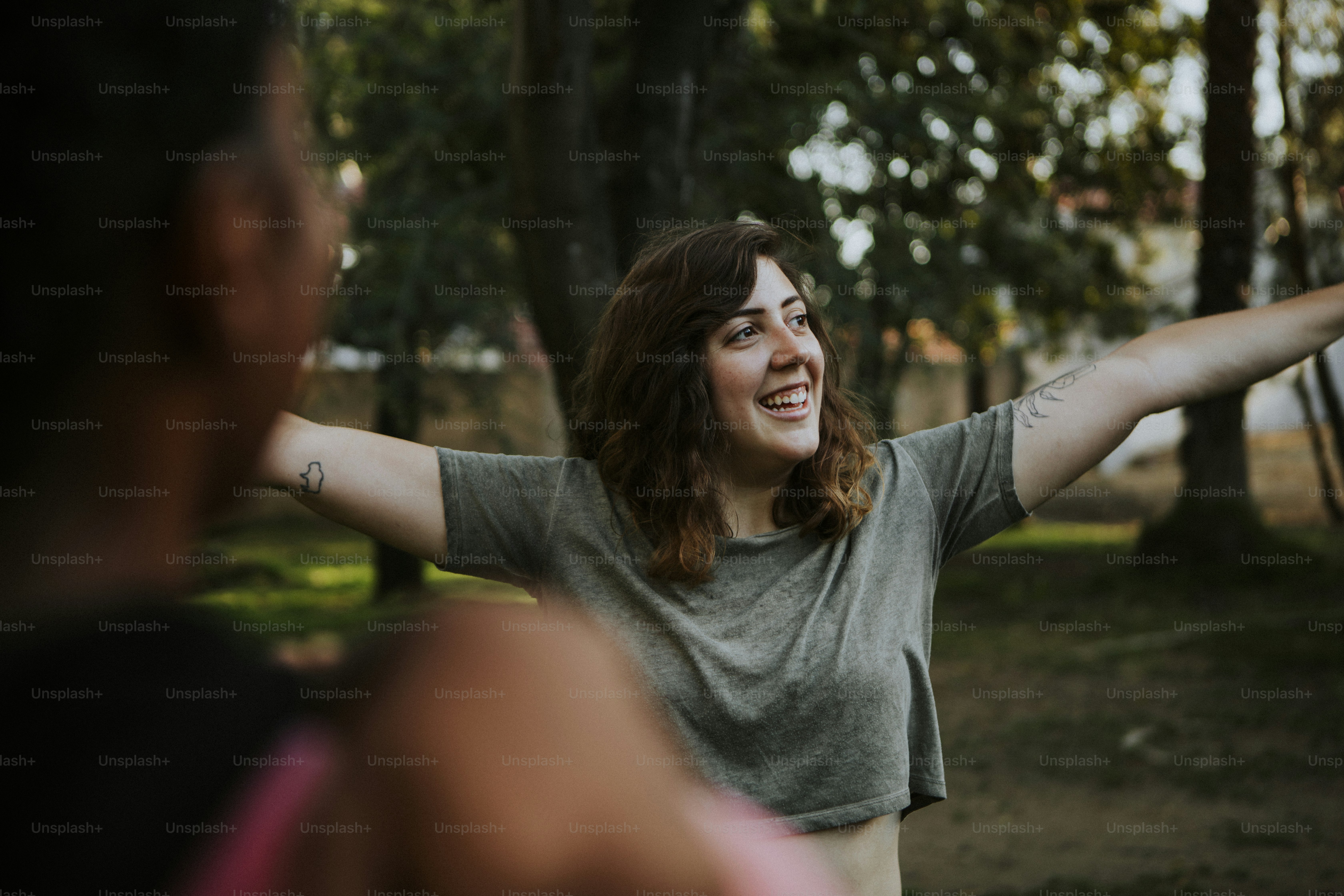 Friends stretching together in the park