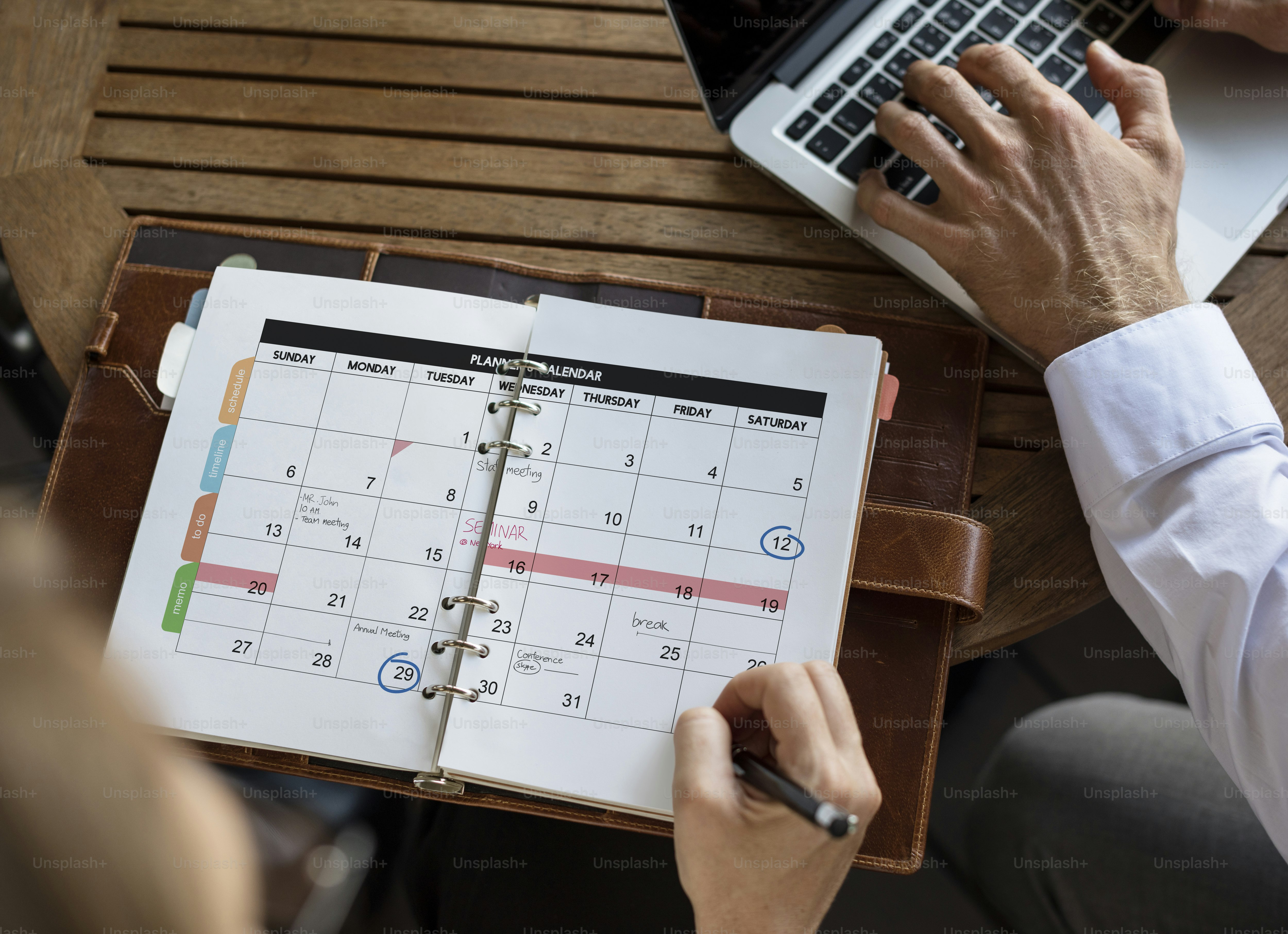 Traveler using budget airfare strategy while comparing flight calendar dates