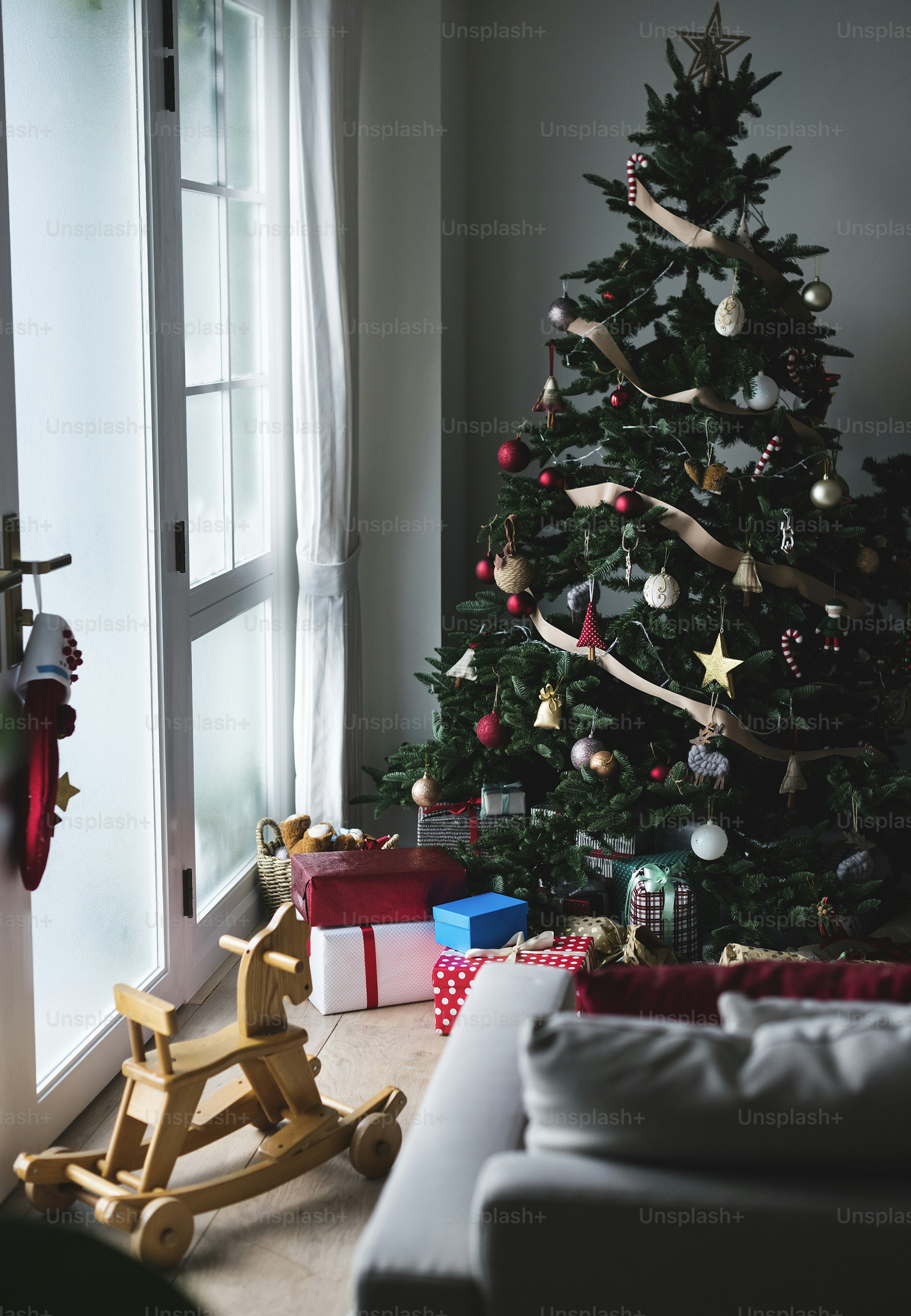 A decorated Christmas tree in a living room