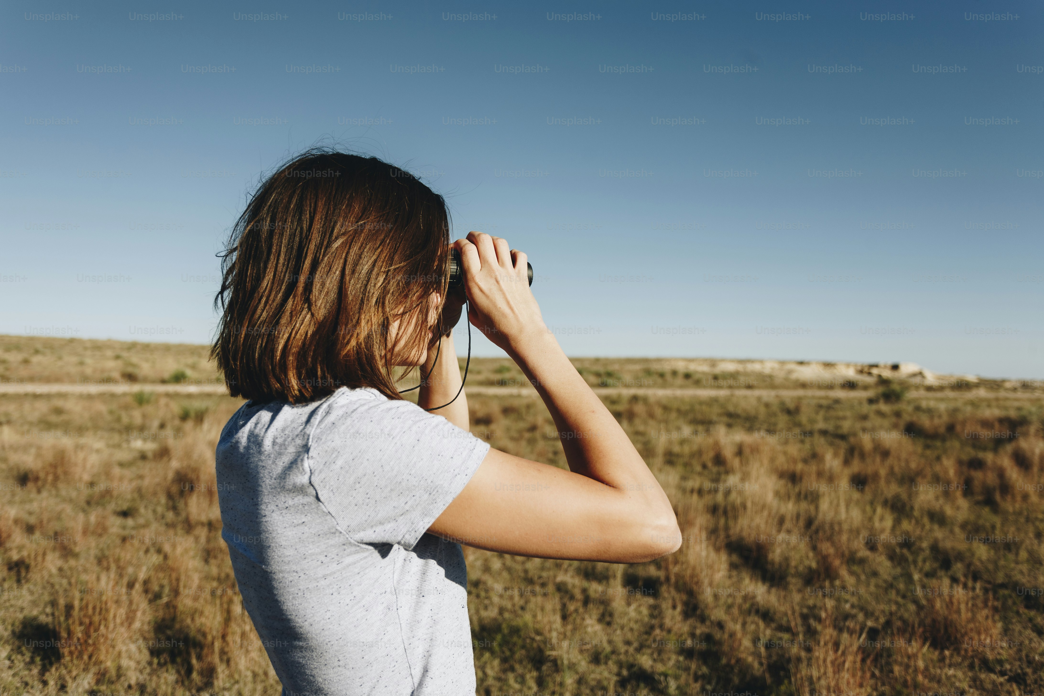 Traveler Using Binoculars