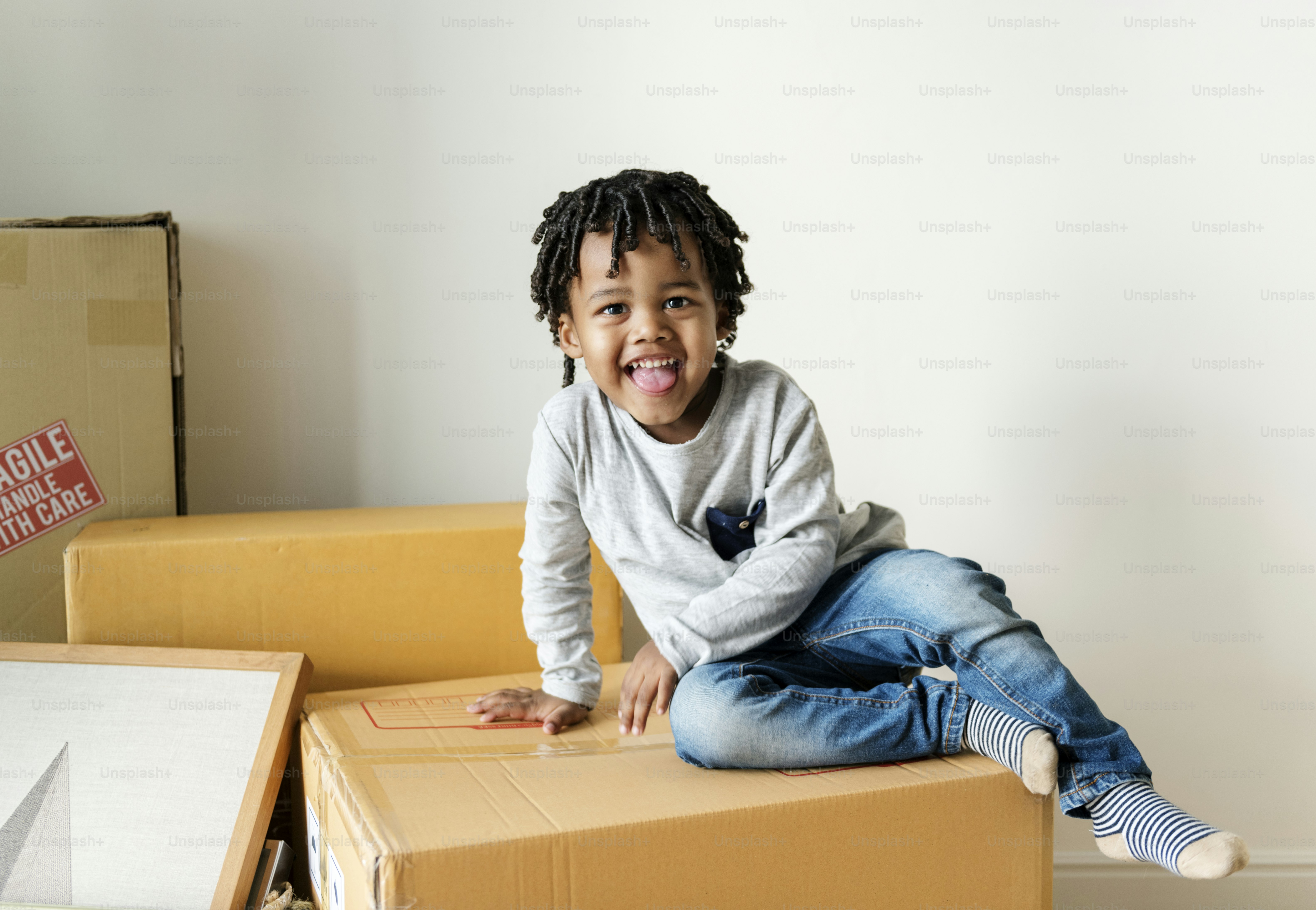 Portrait of black young boy photo – Brick wall Image on Unsplash