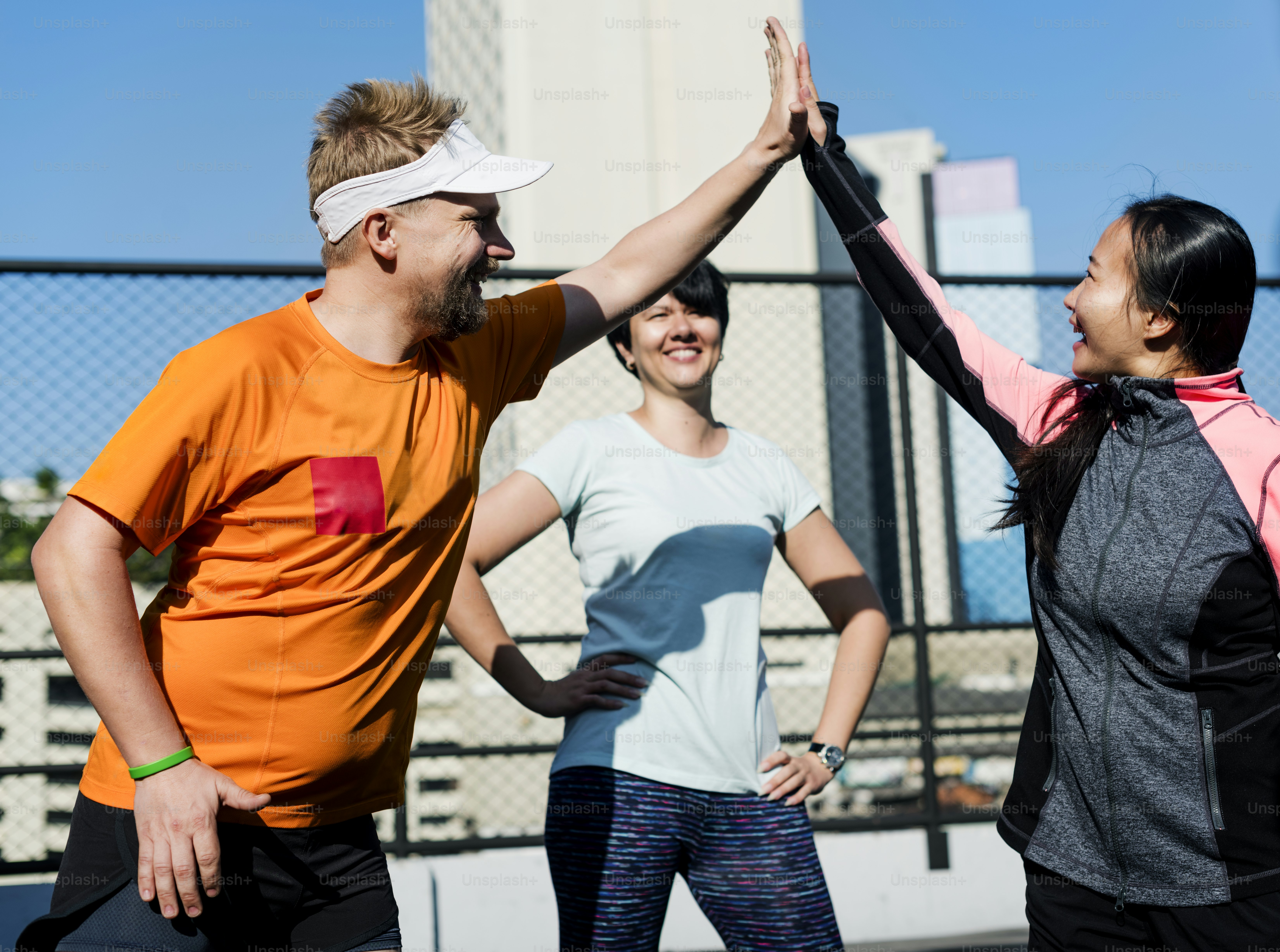 People exercising at fitness gym