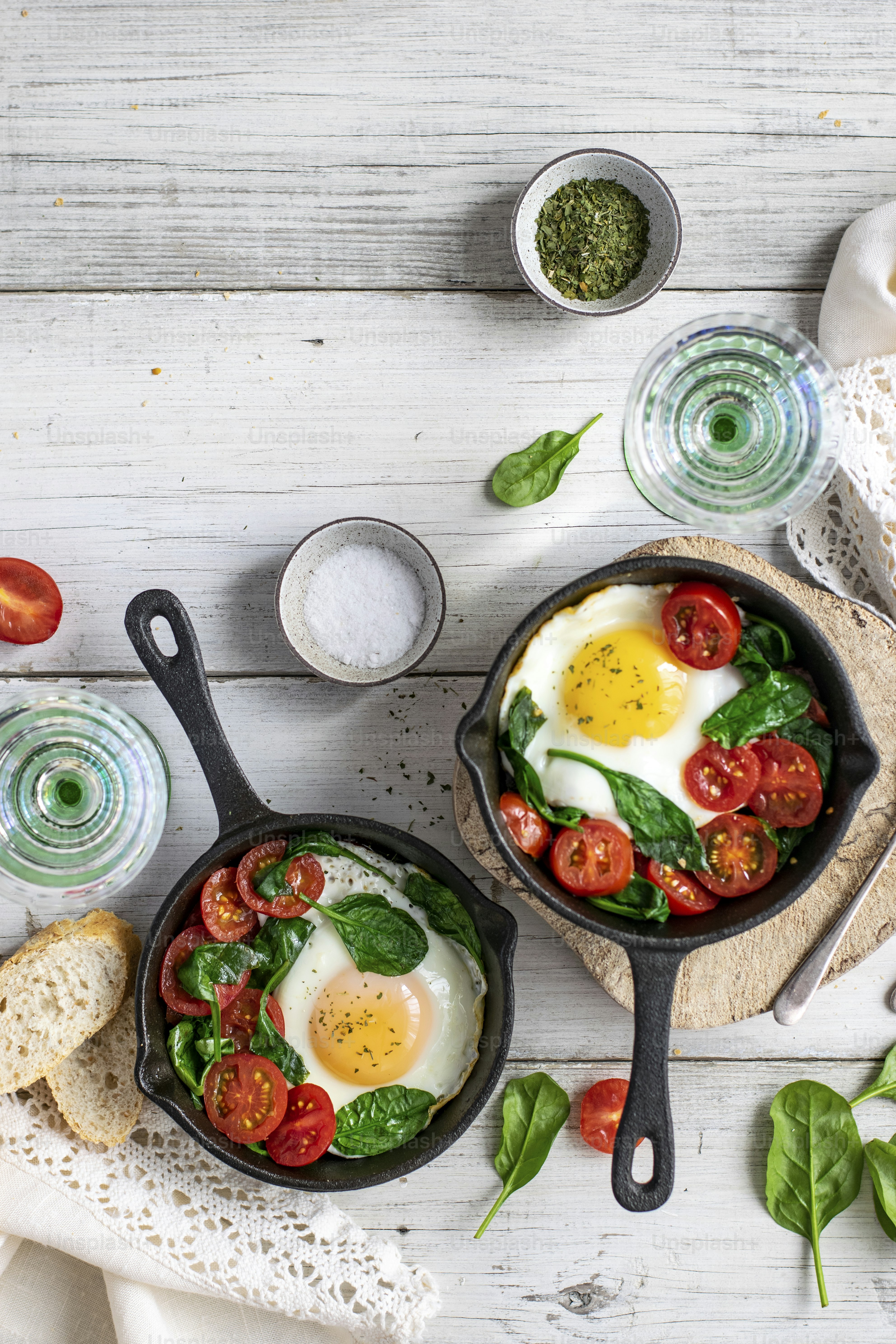 Freshly cooked eggs and tomatoes in a skillet