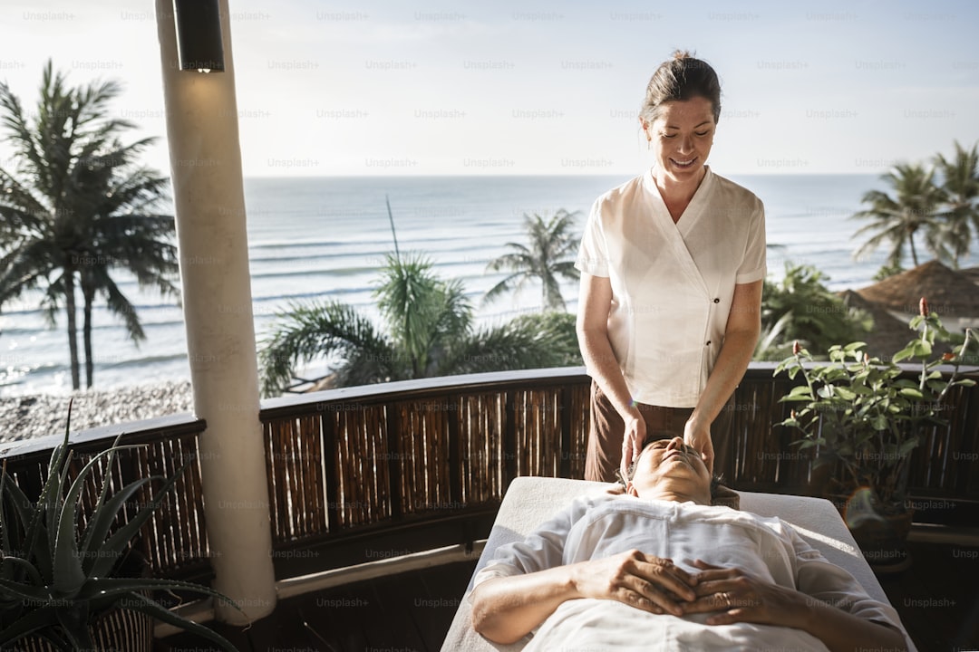 Massage therapist massaging at a spa
