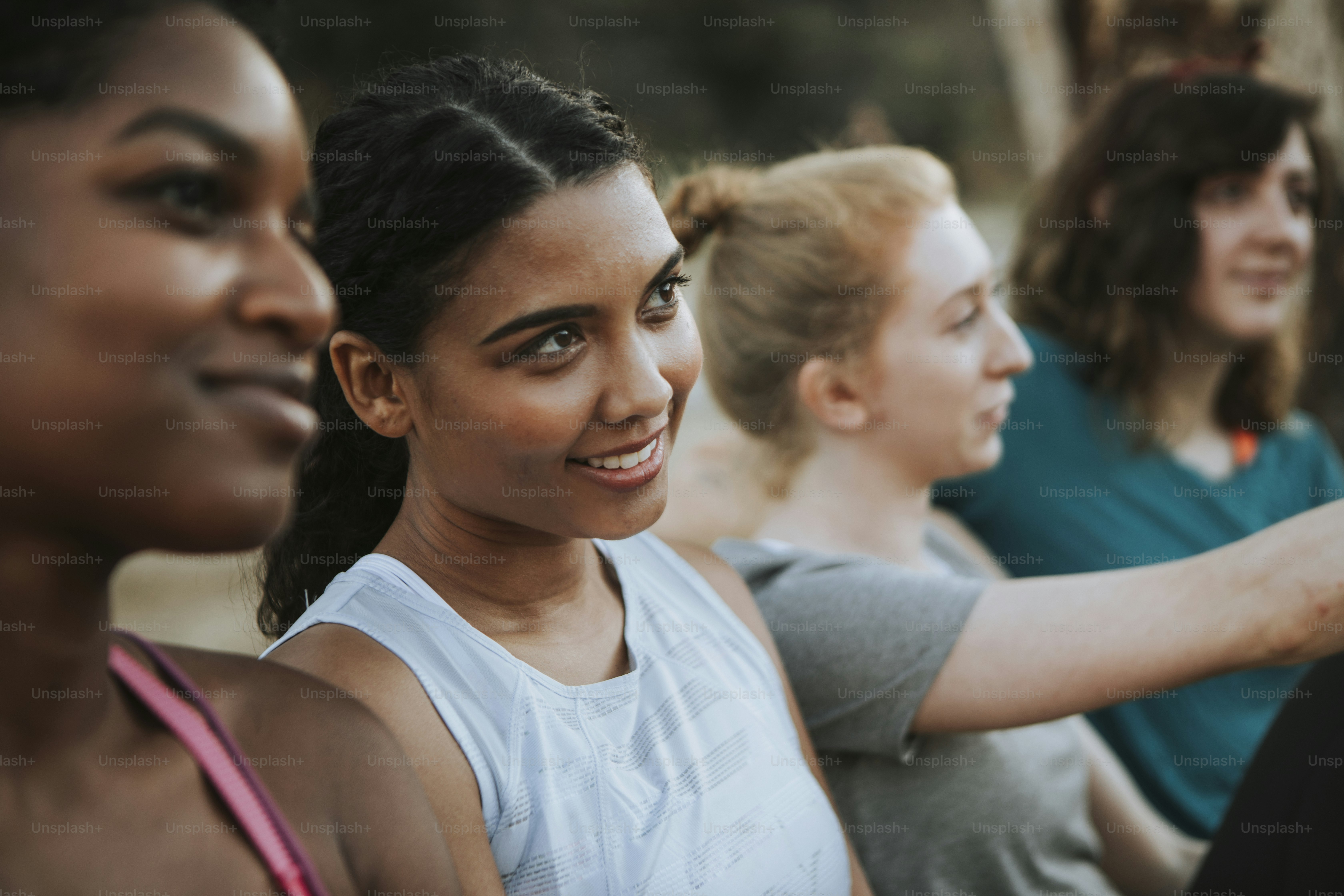 Friends relaxing on a park bench
