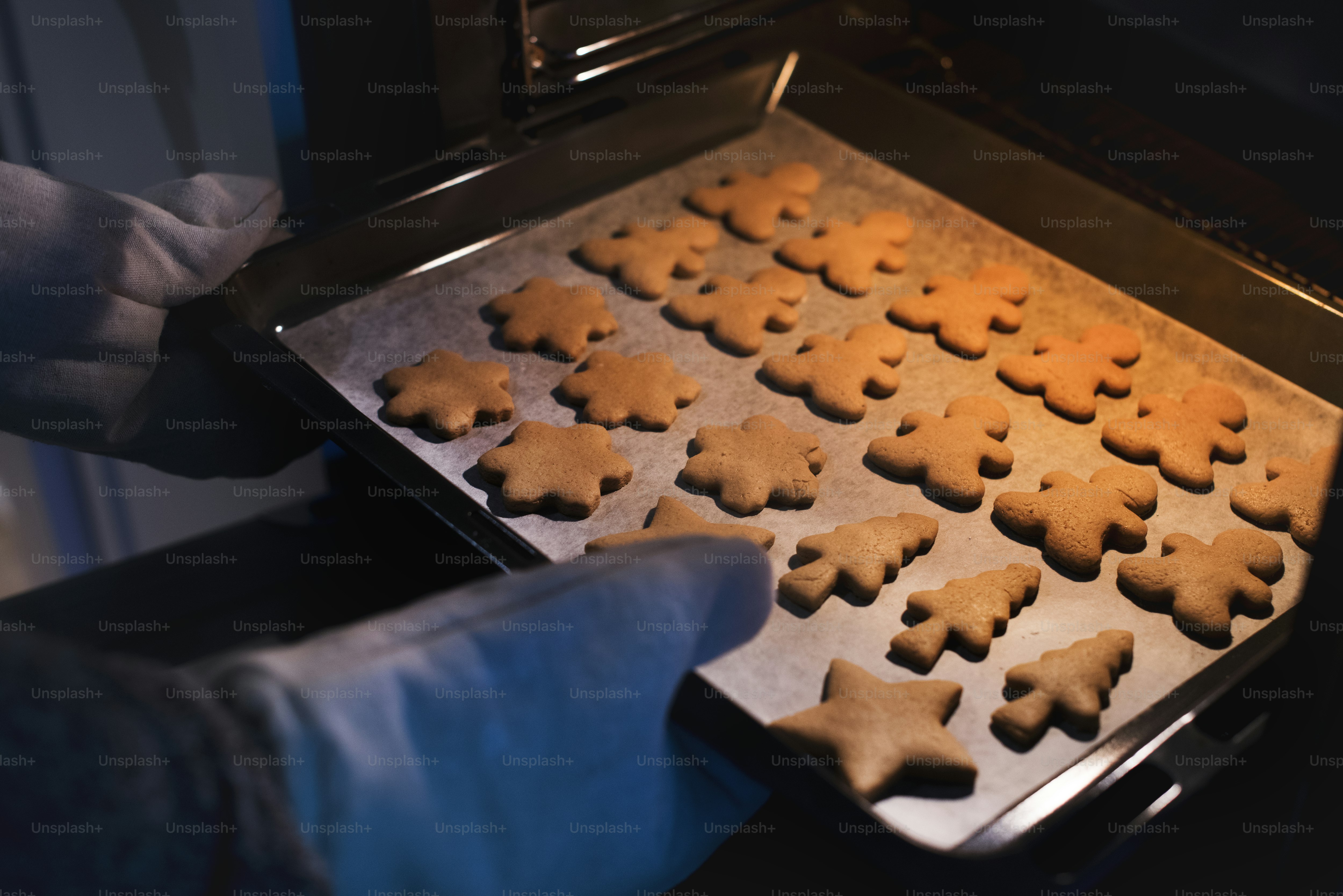 Gingerbread cookies fresh out of the oven photo Baking pan Image on