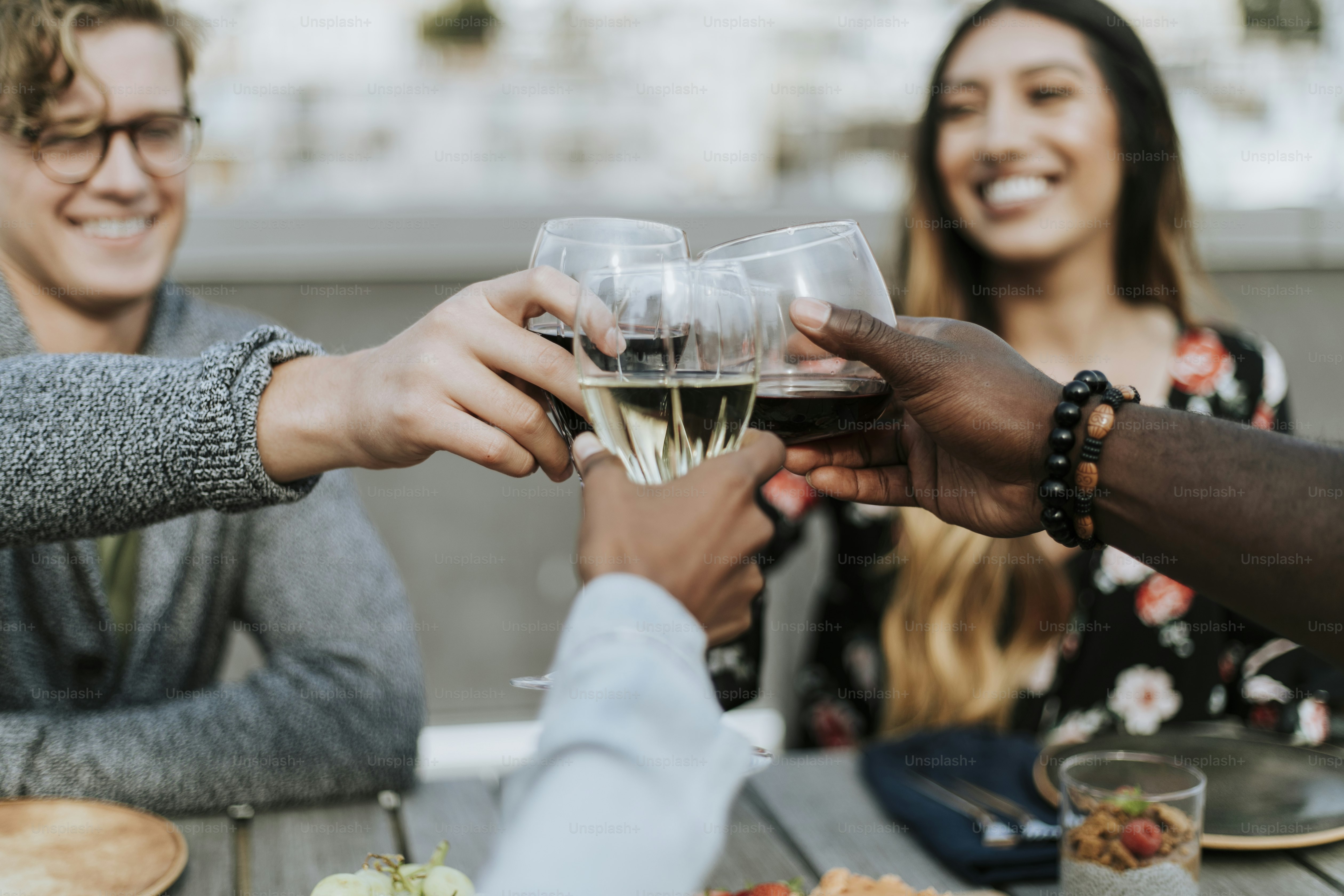 Friends toasting at a rooftop party photo – Summer Image on Unsplash