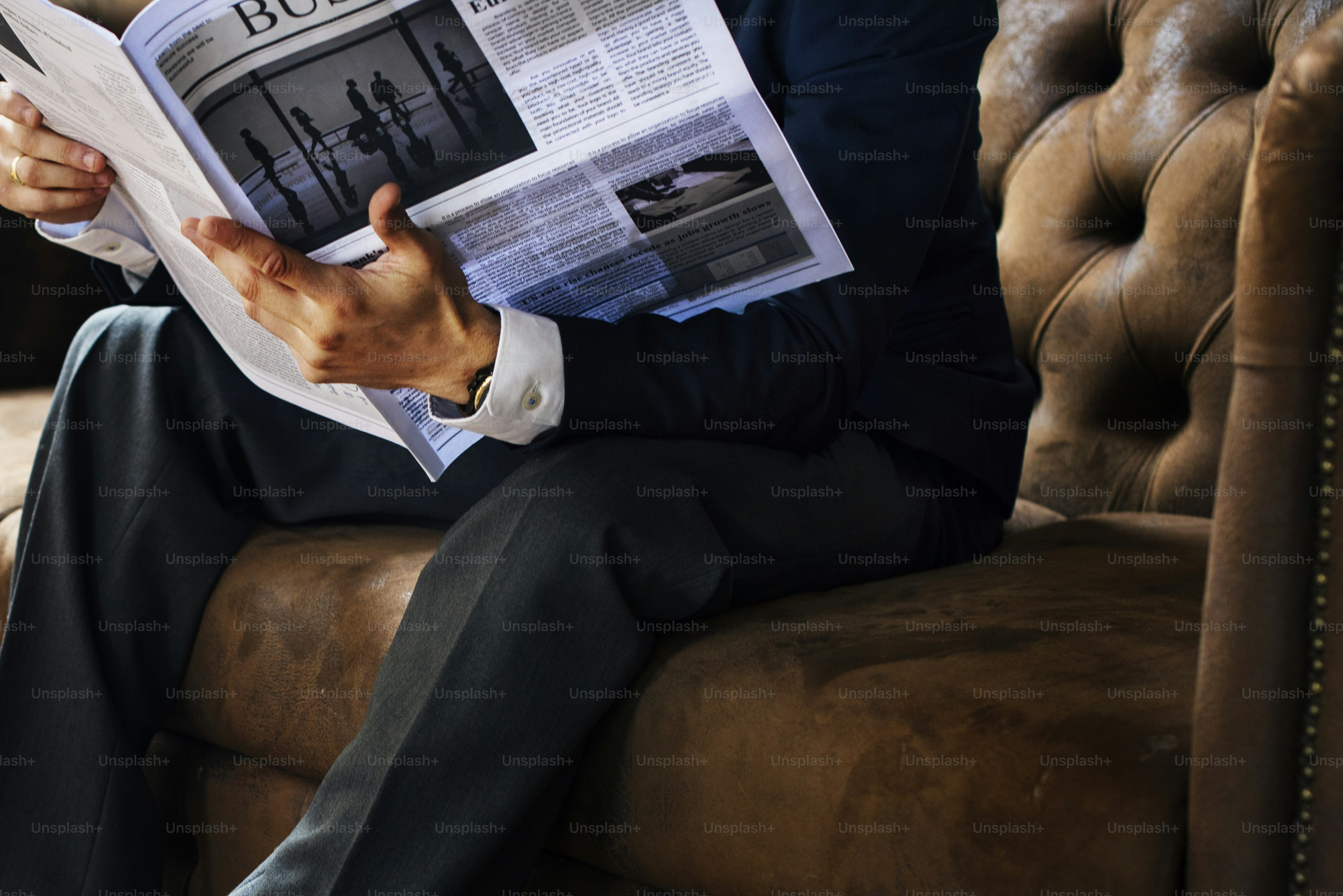 A businessman reading newspaper on a couch

***These documents are our own generic designs. They do not infringe on any copyrighted designs.***