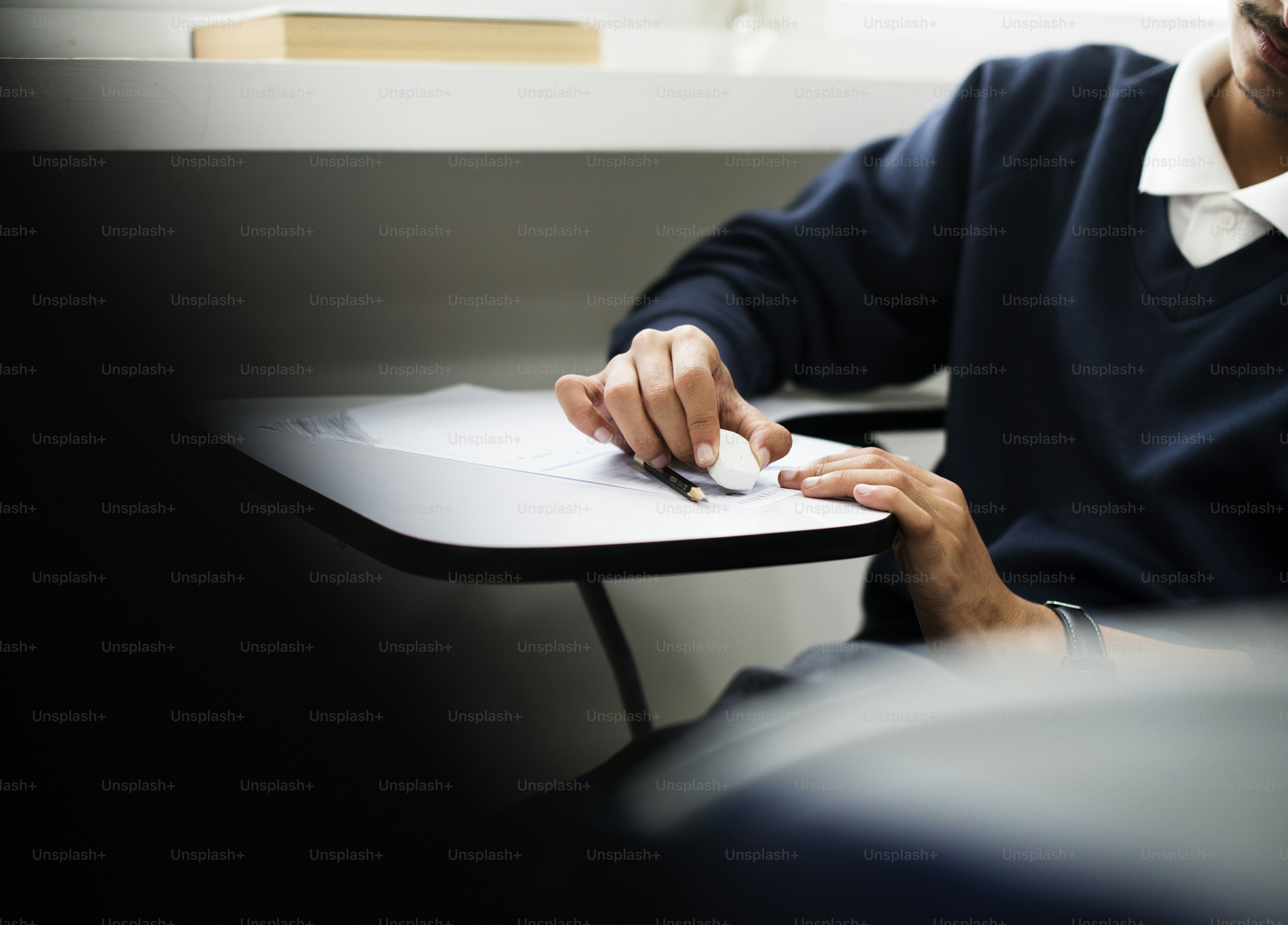 Young Muslim student in class