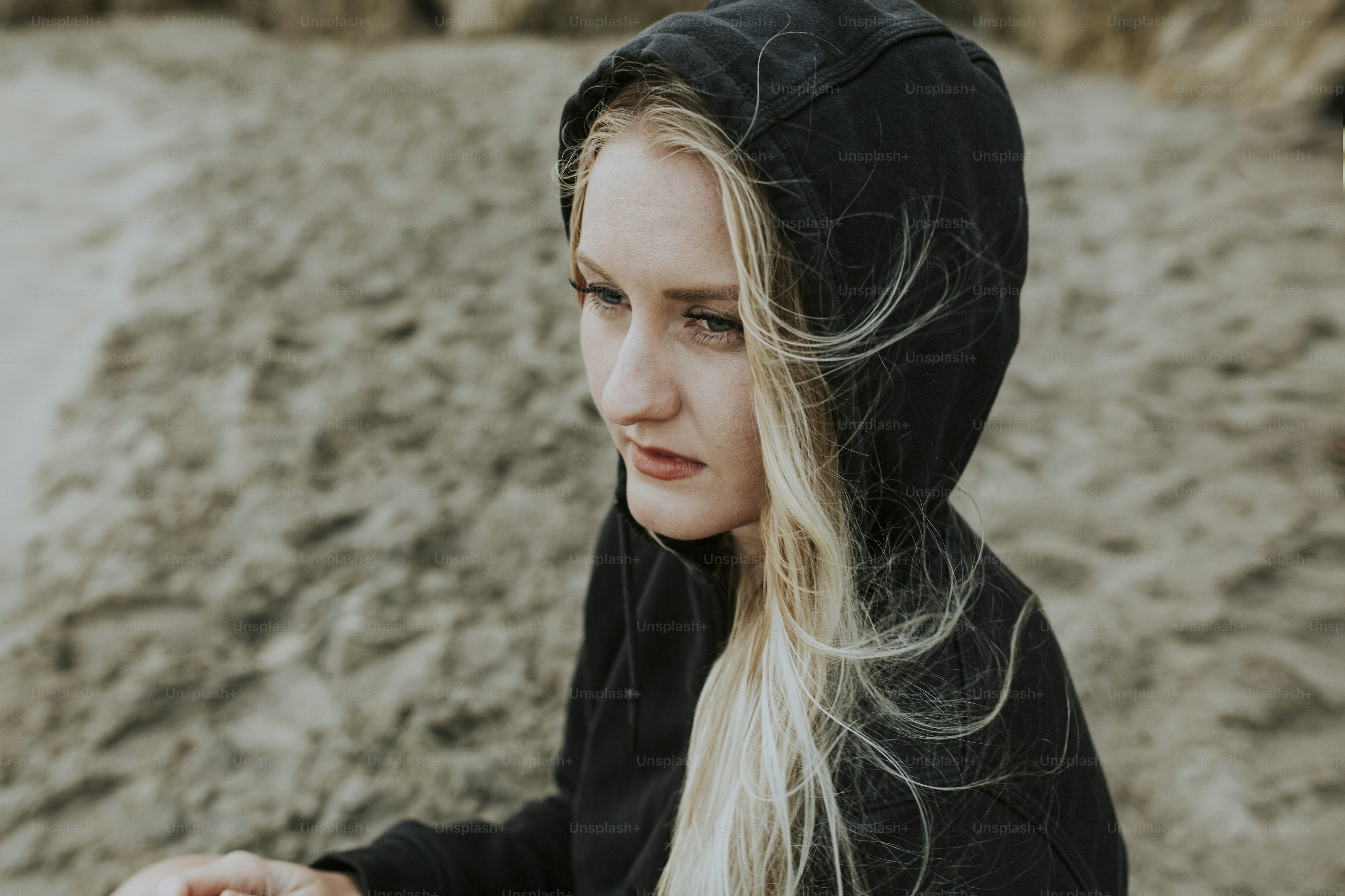 Woman sitting on the beach photo – Relaxation Image on Unsplash