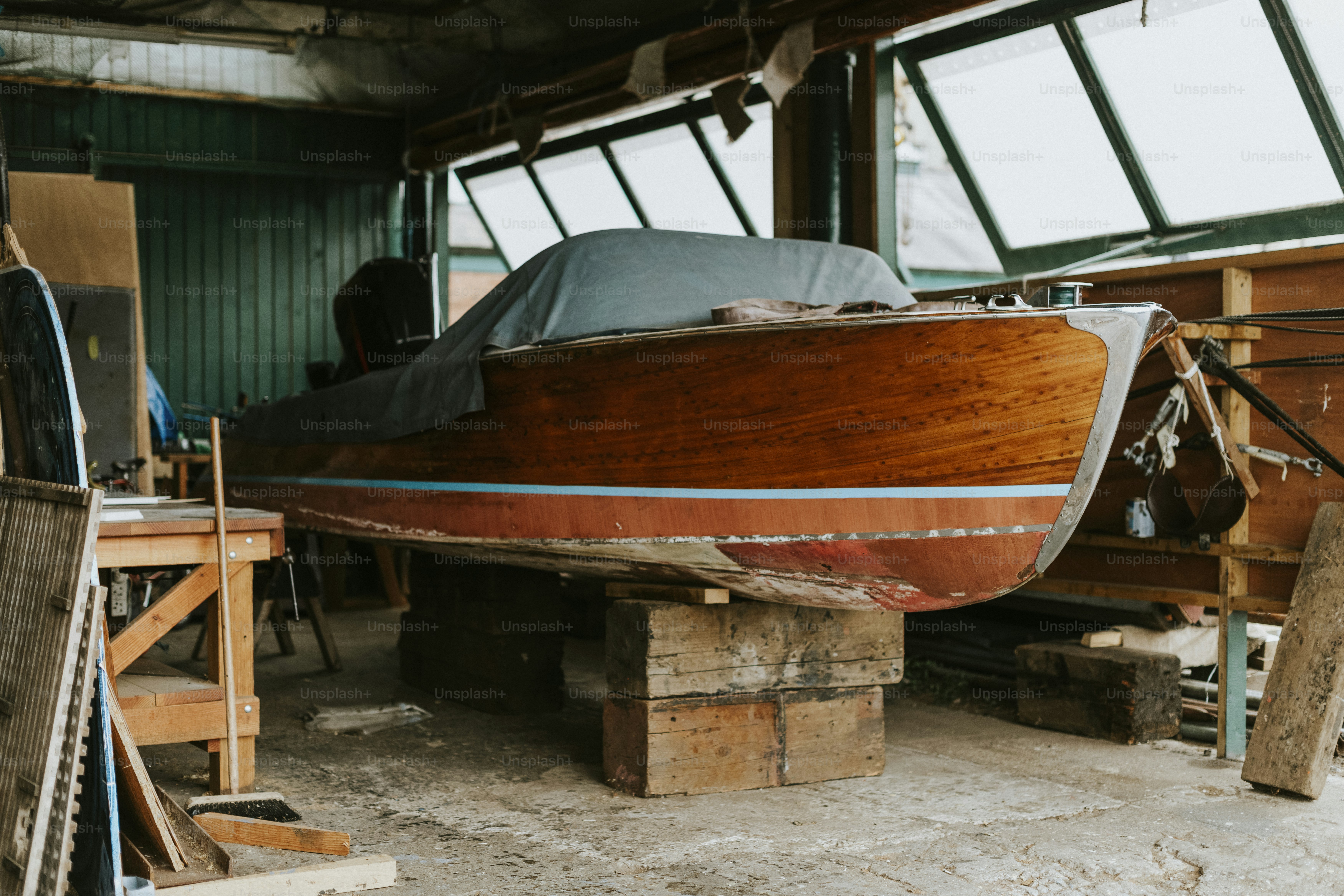 Old wooden boat in a garage