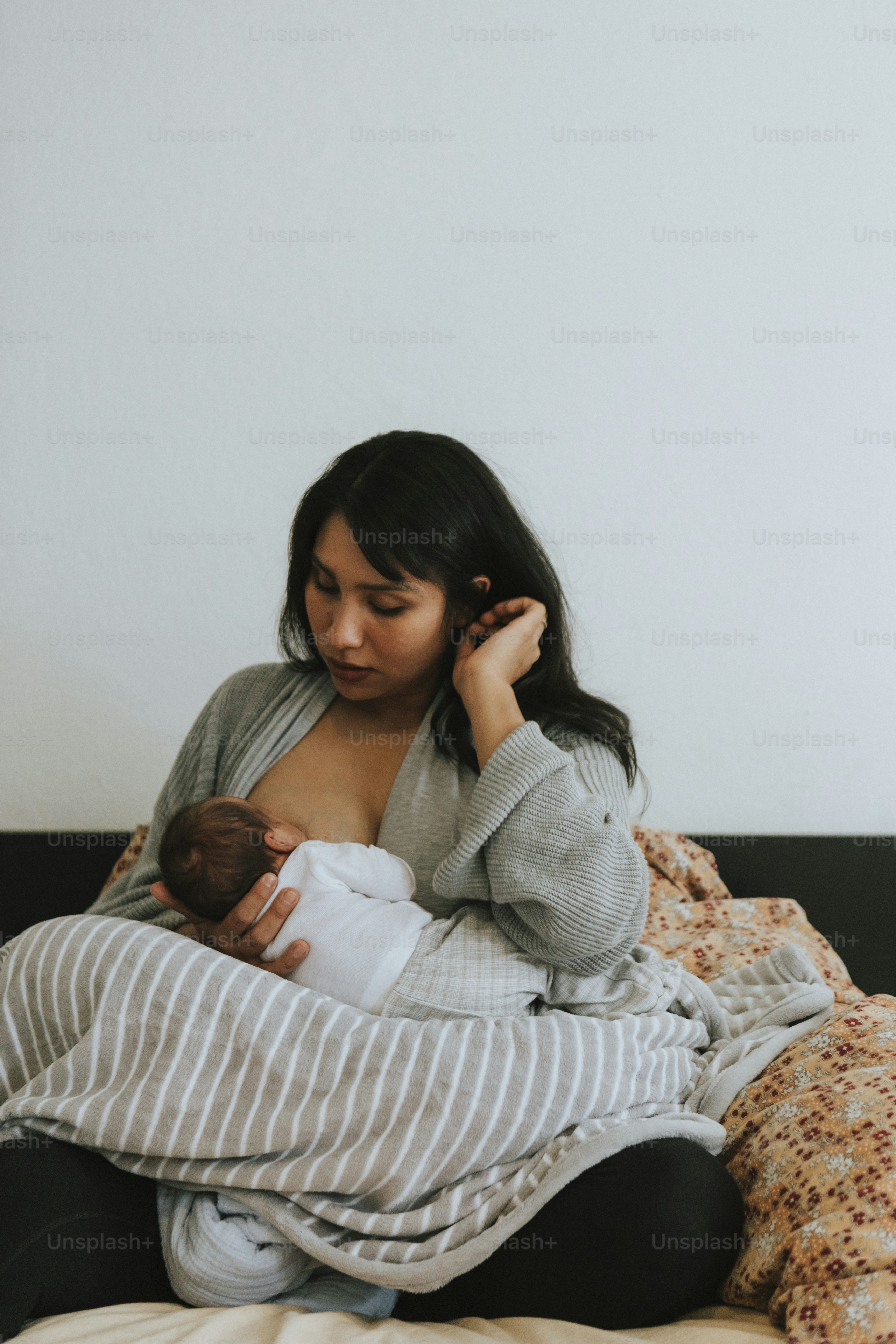 Mother breastfeeding her baby