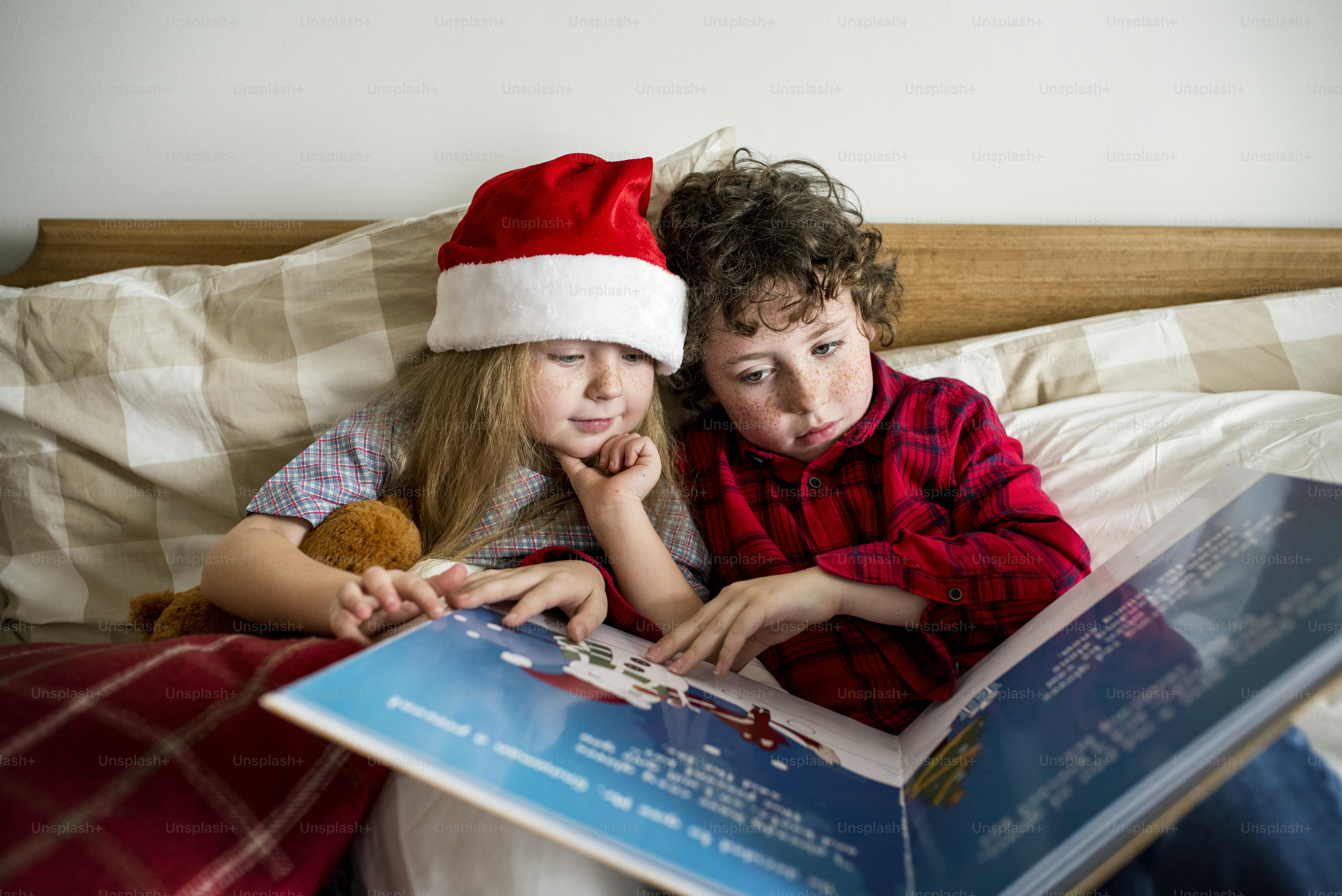 A Caucasian siblings enjoying Christmas holiday