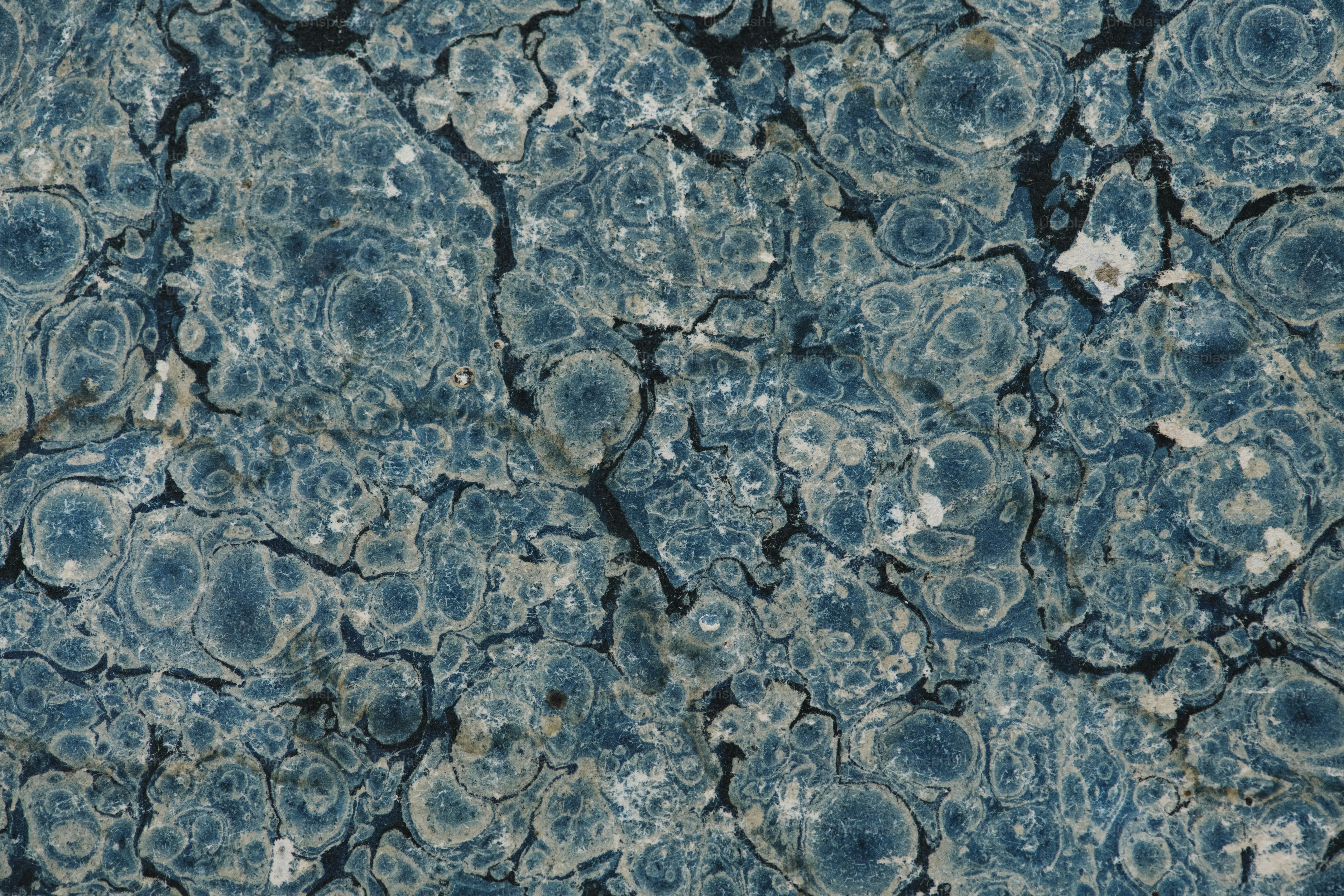 Blauer abstrakter strukturierter Papierhintergrund