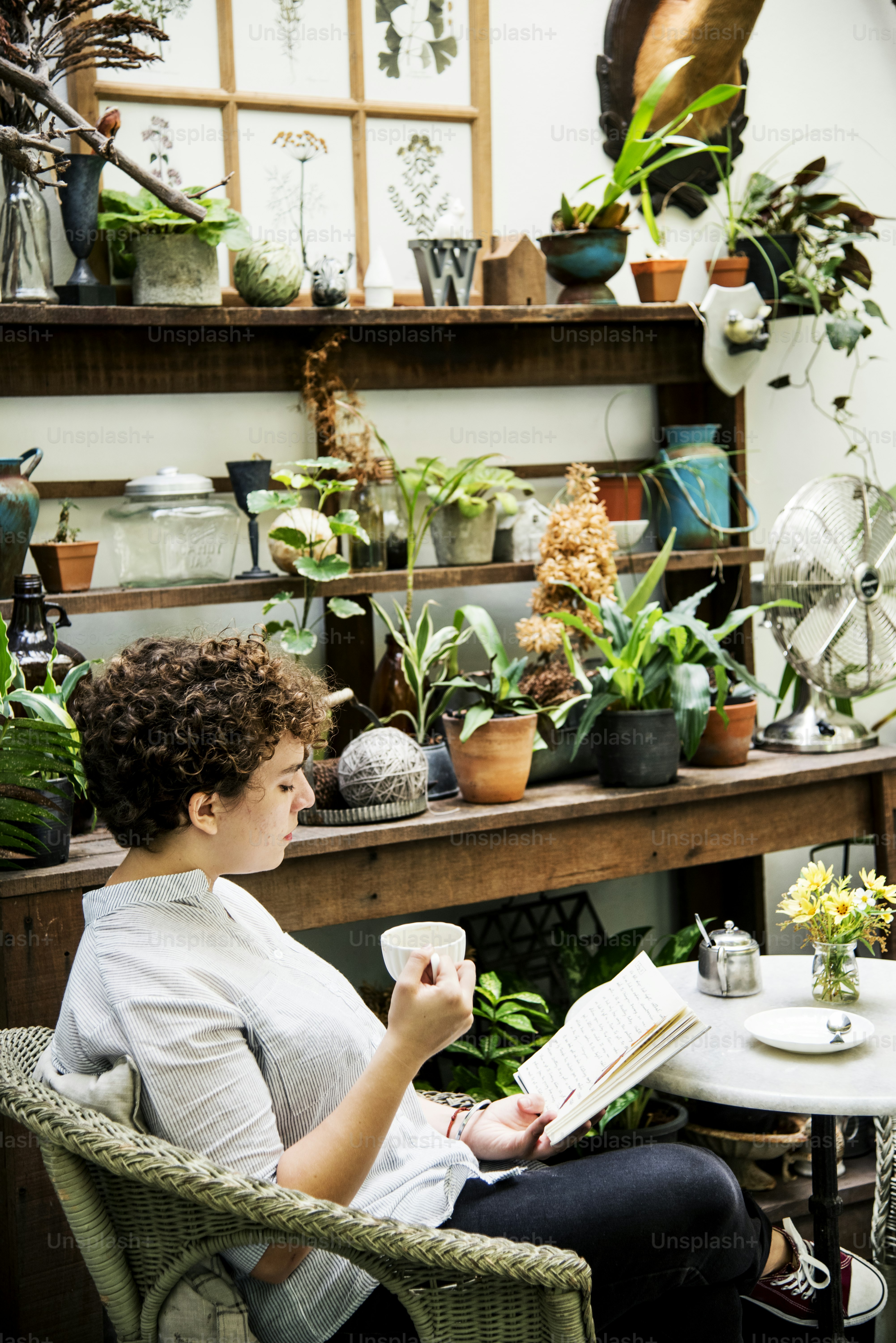 Person checking local flower shop reviews on a laptop before ordering flowers