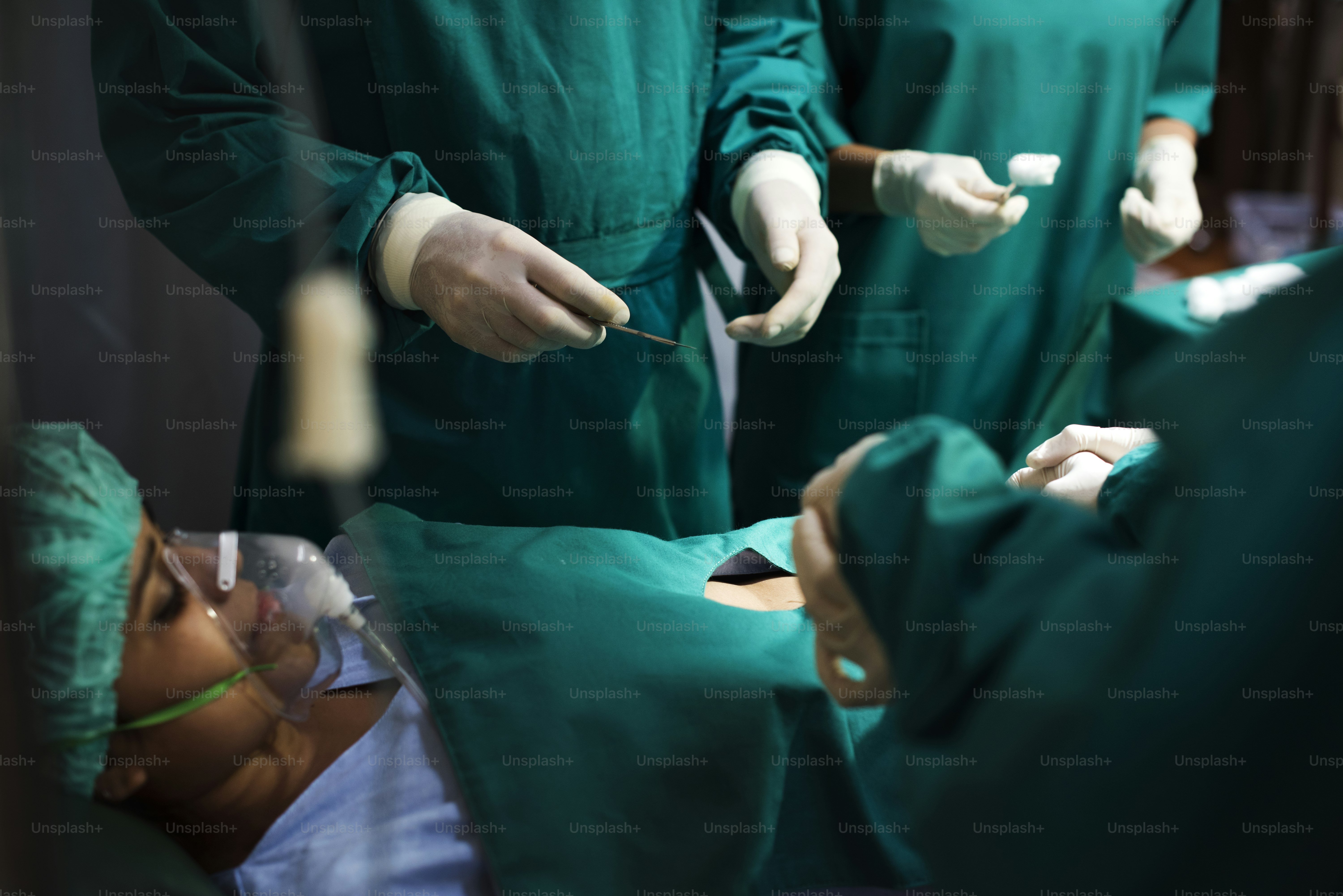 Doctors doing an operation photo – Hospital Image on Unsplash