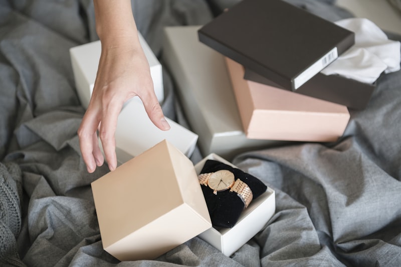 Woman reaching hand to grab hand watch