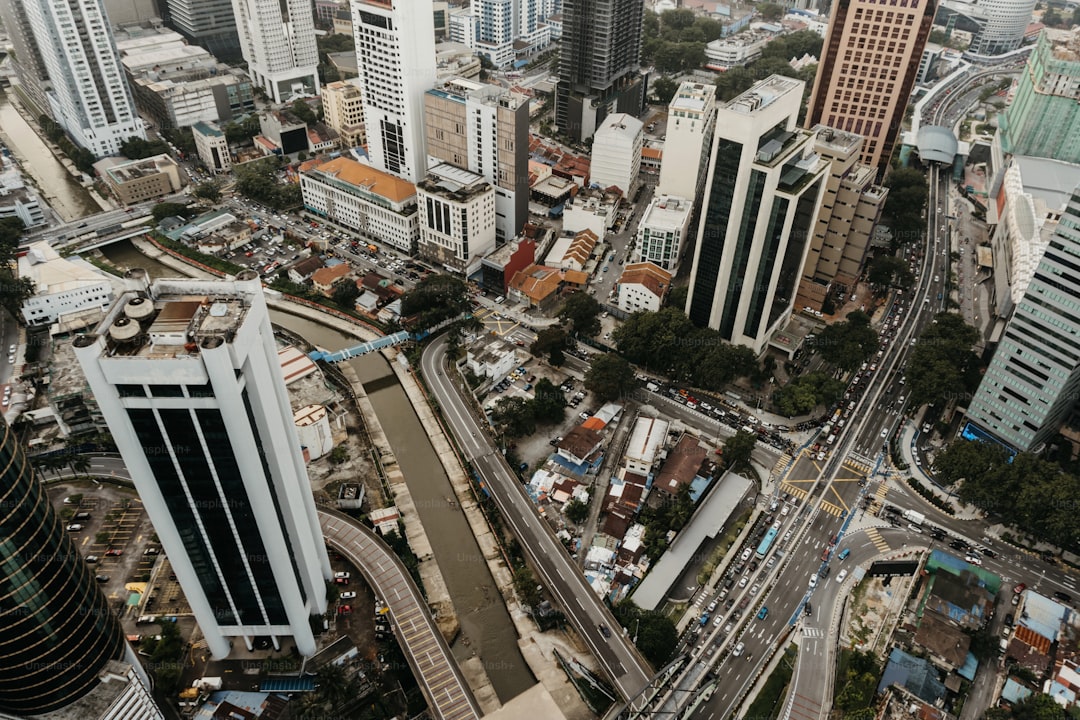 An aerial view of a city with tall buildings