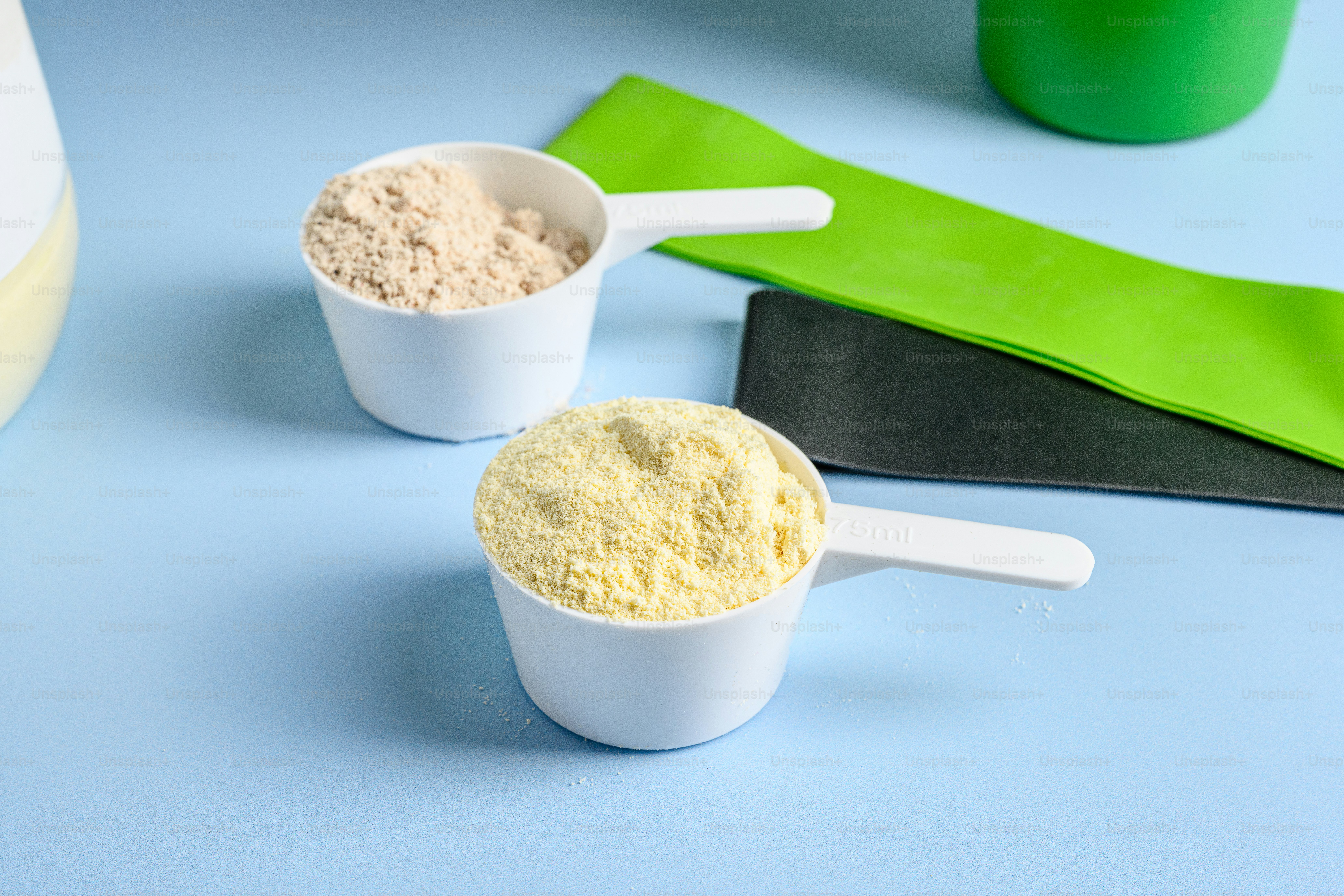 A couple of scoops of food sitting on top of a table