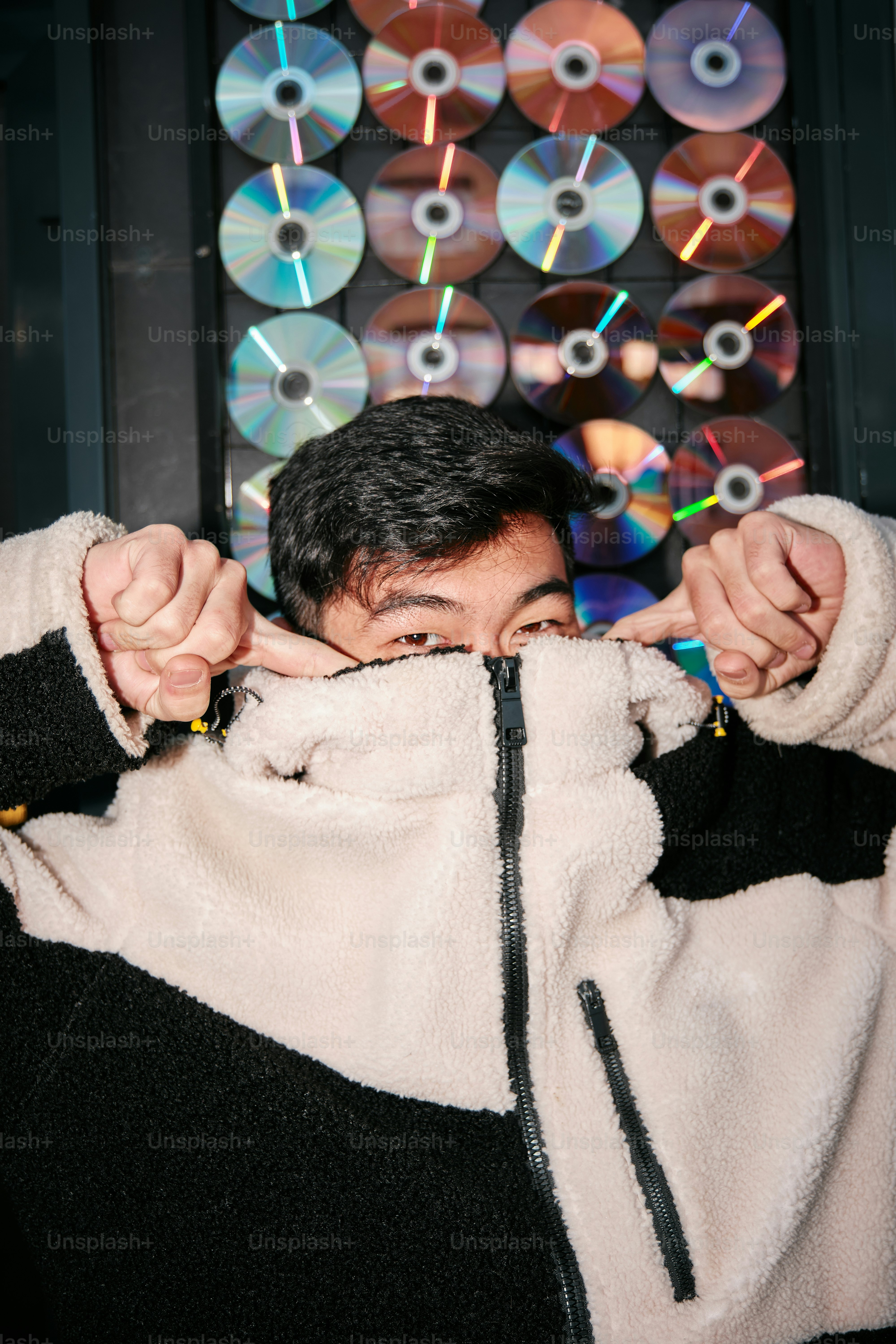 A man covering his face with his hands