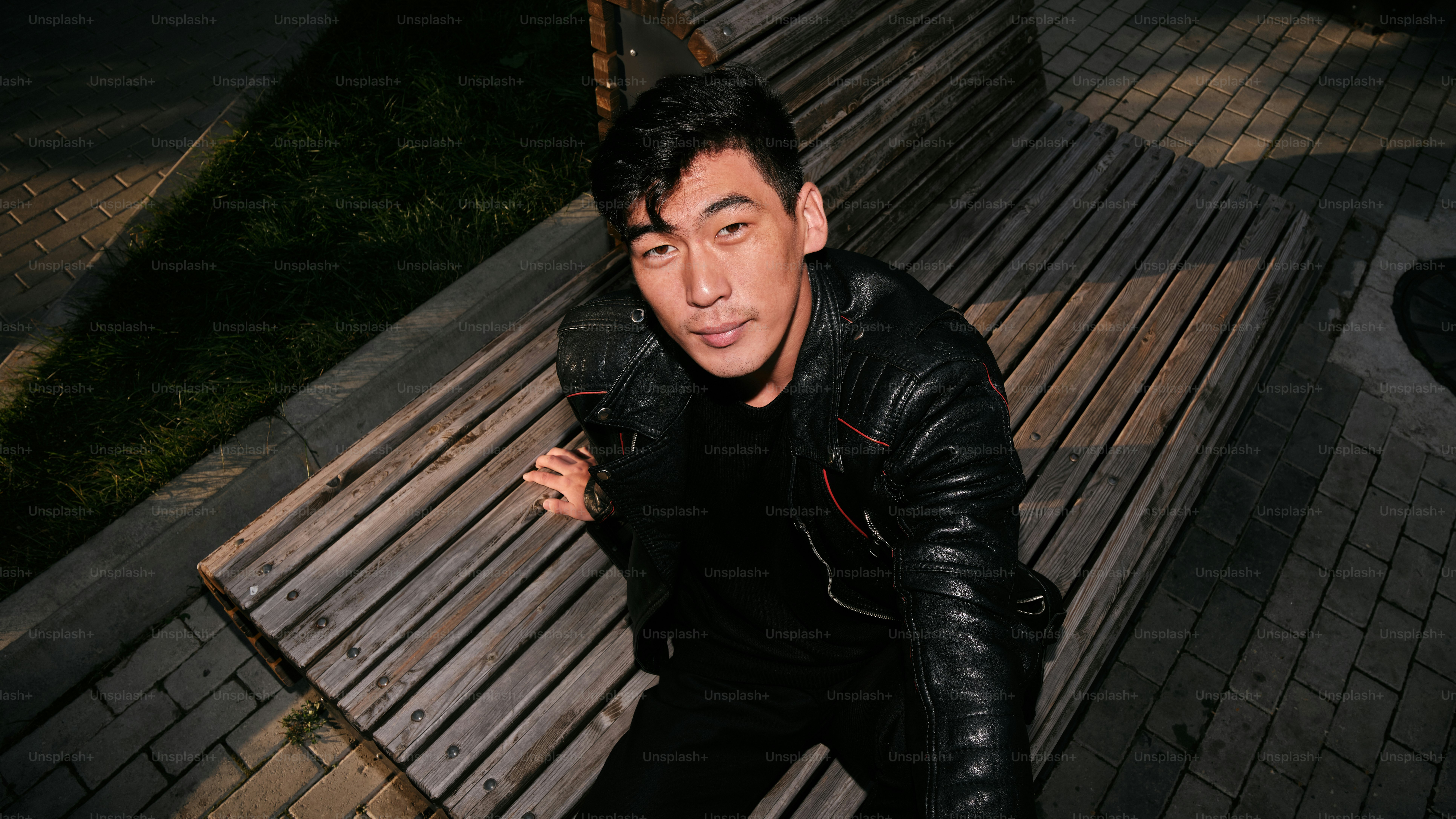 Portrait of a asian man with harsh light from the camera flash