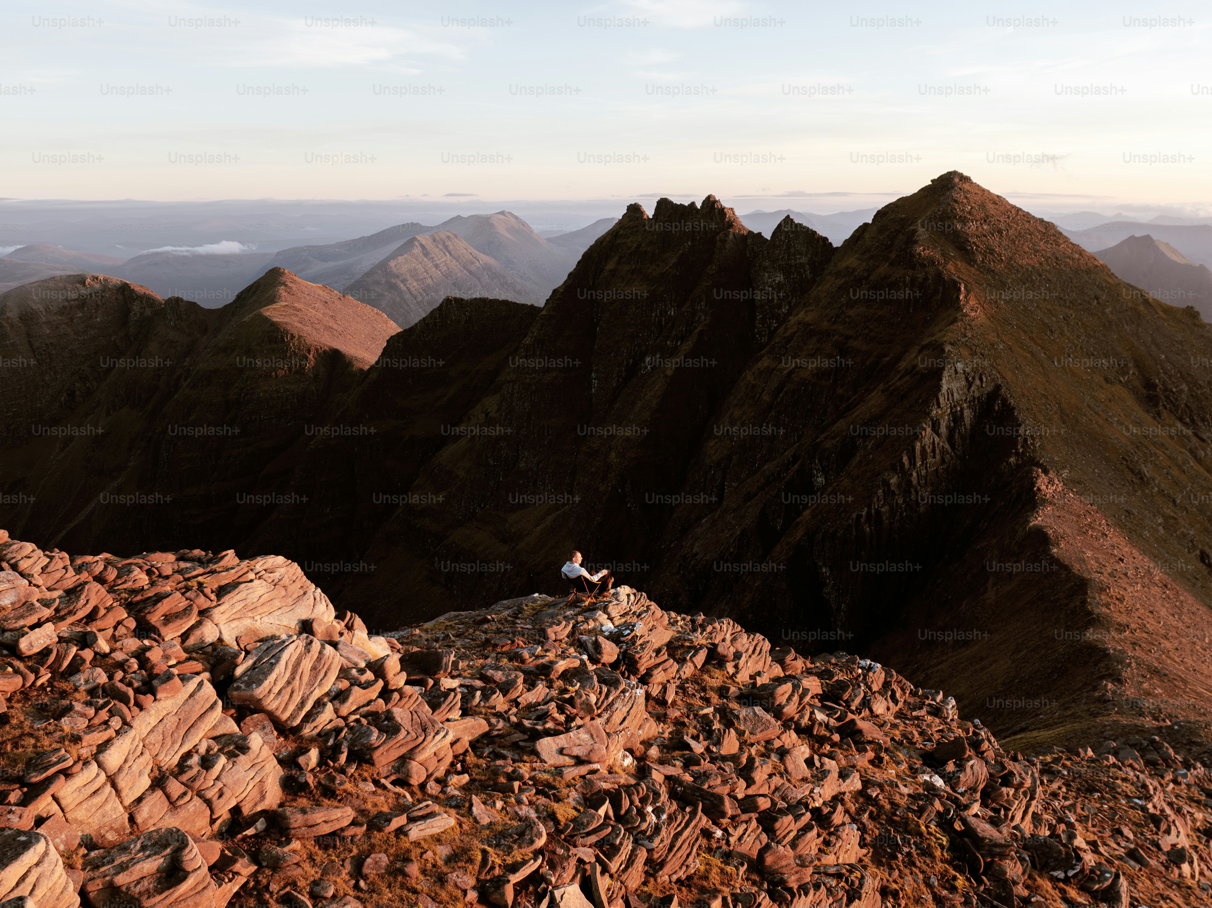 A view of a mountain range from the top of a mountain
