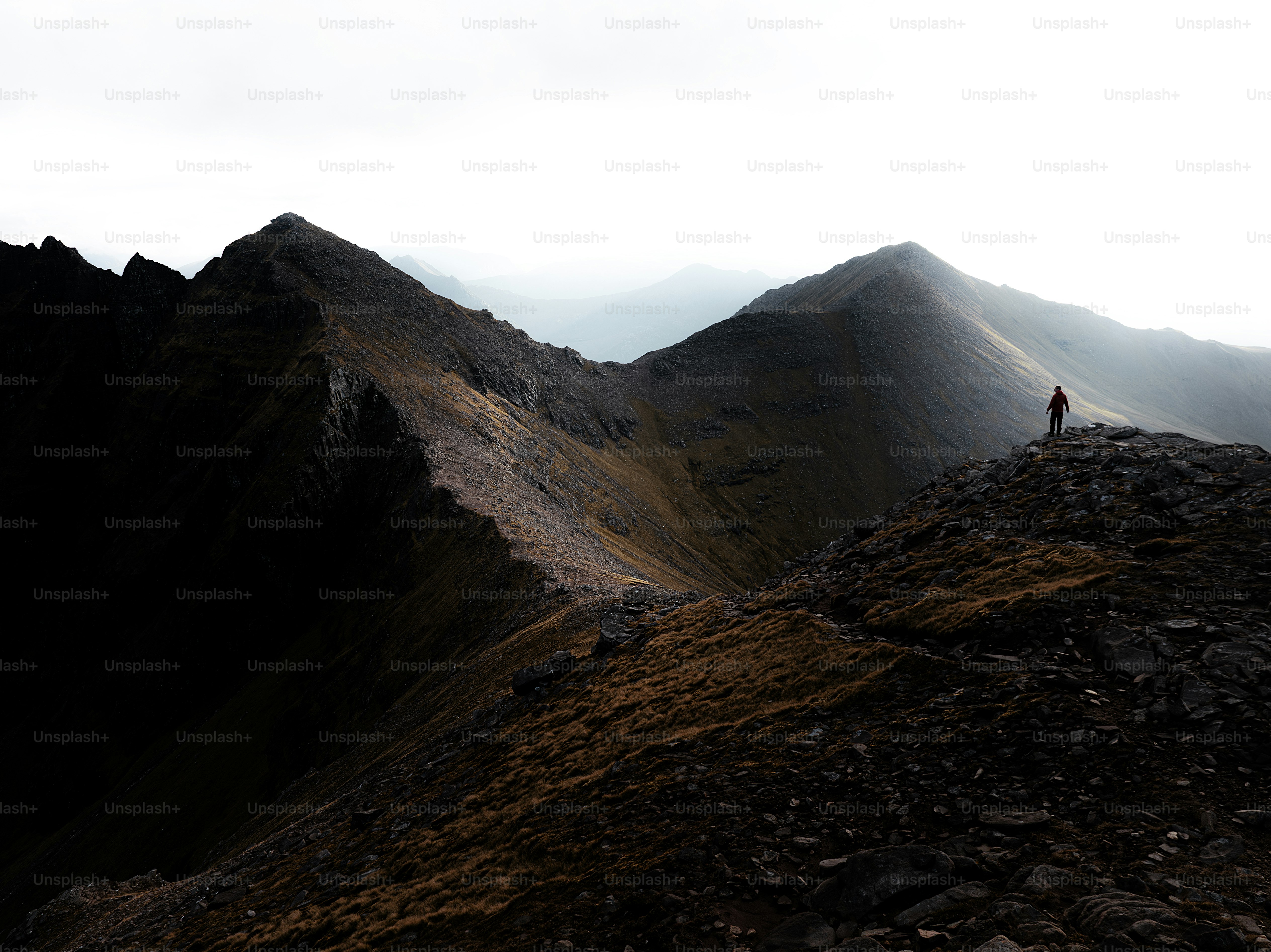 A person standing on top of a mountain
